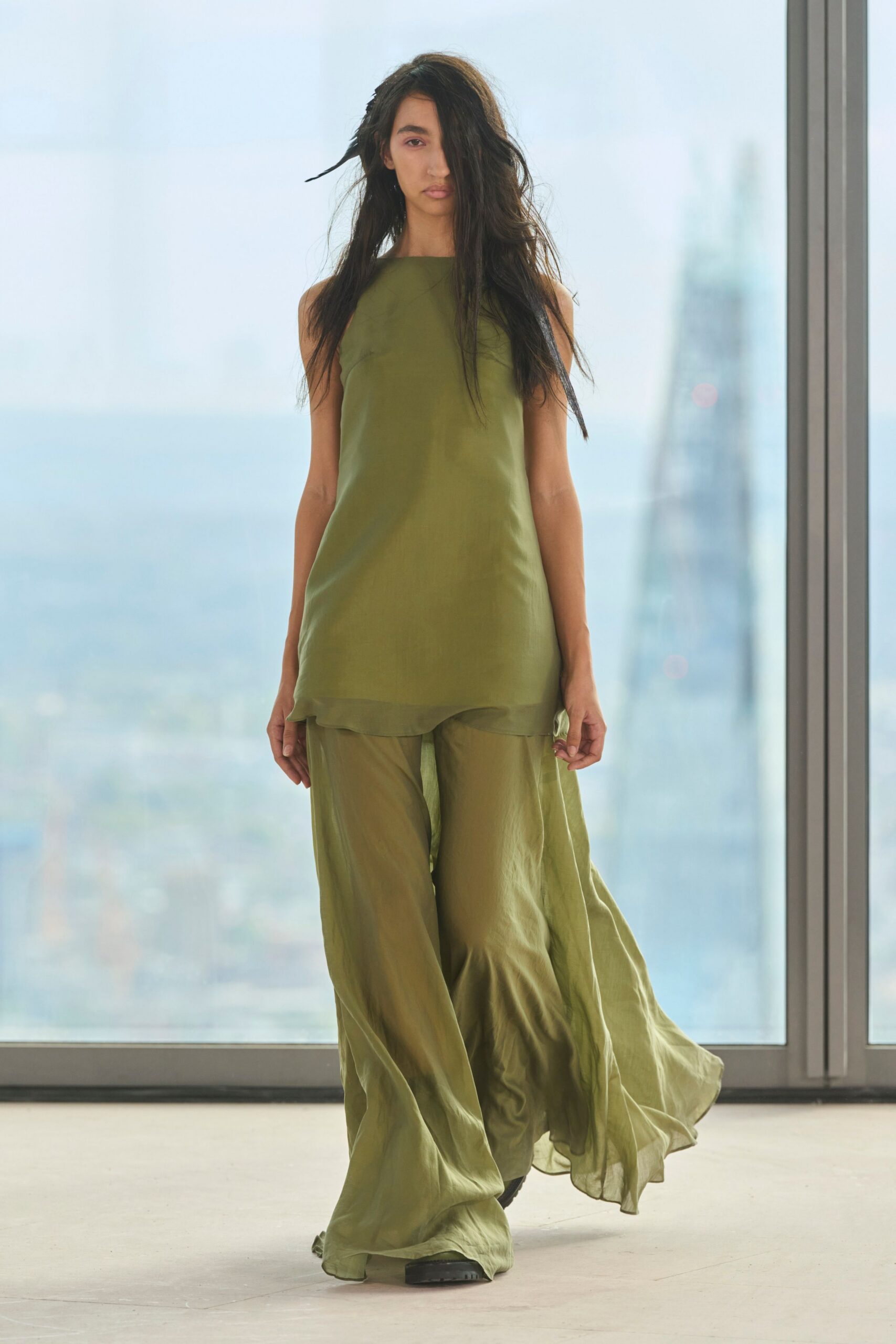 green silk sleeveless high-neck relaxed flowing top