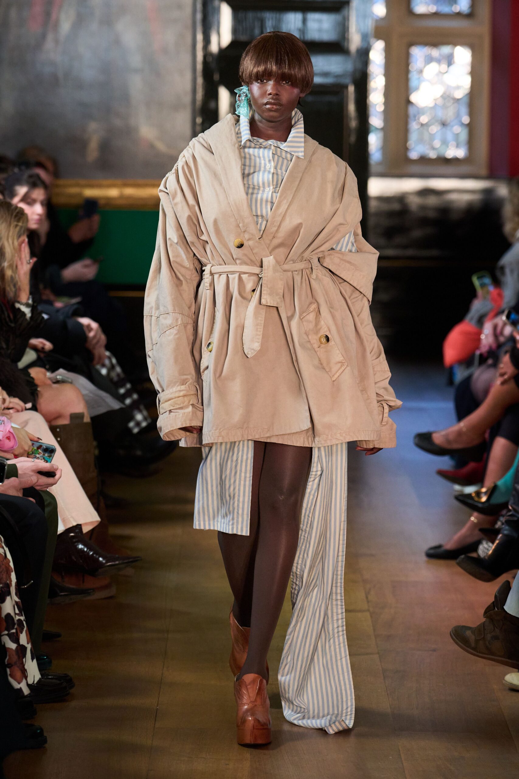 beige oversized coat with striped shirt