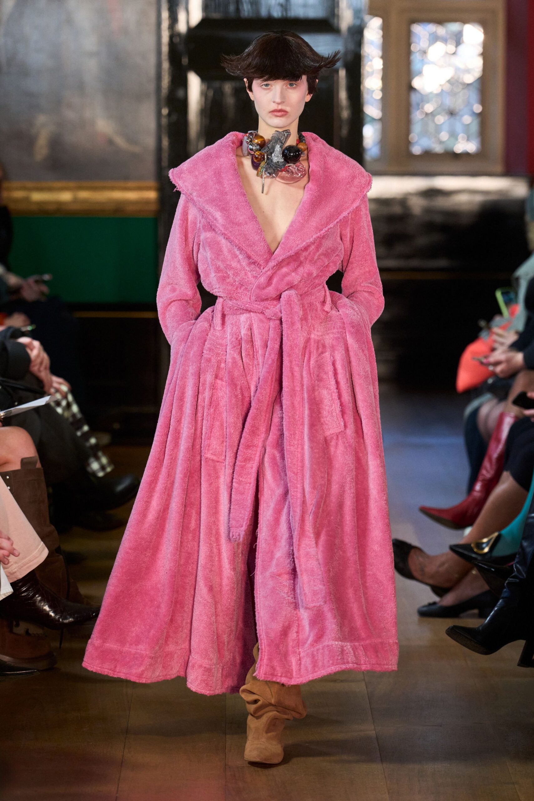 pink faux-fur coat with brown shoes