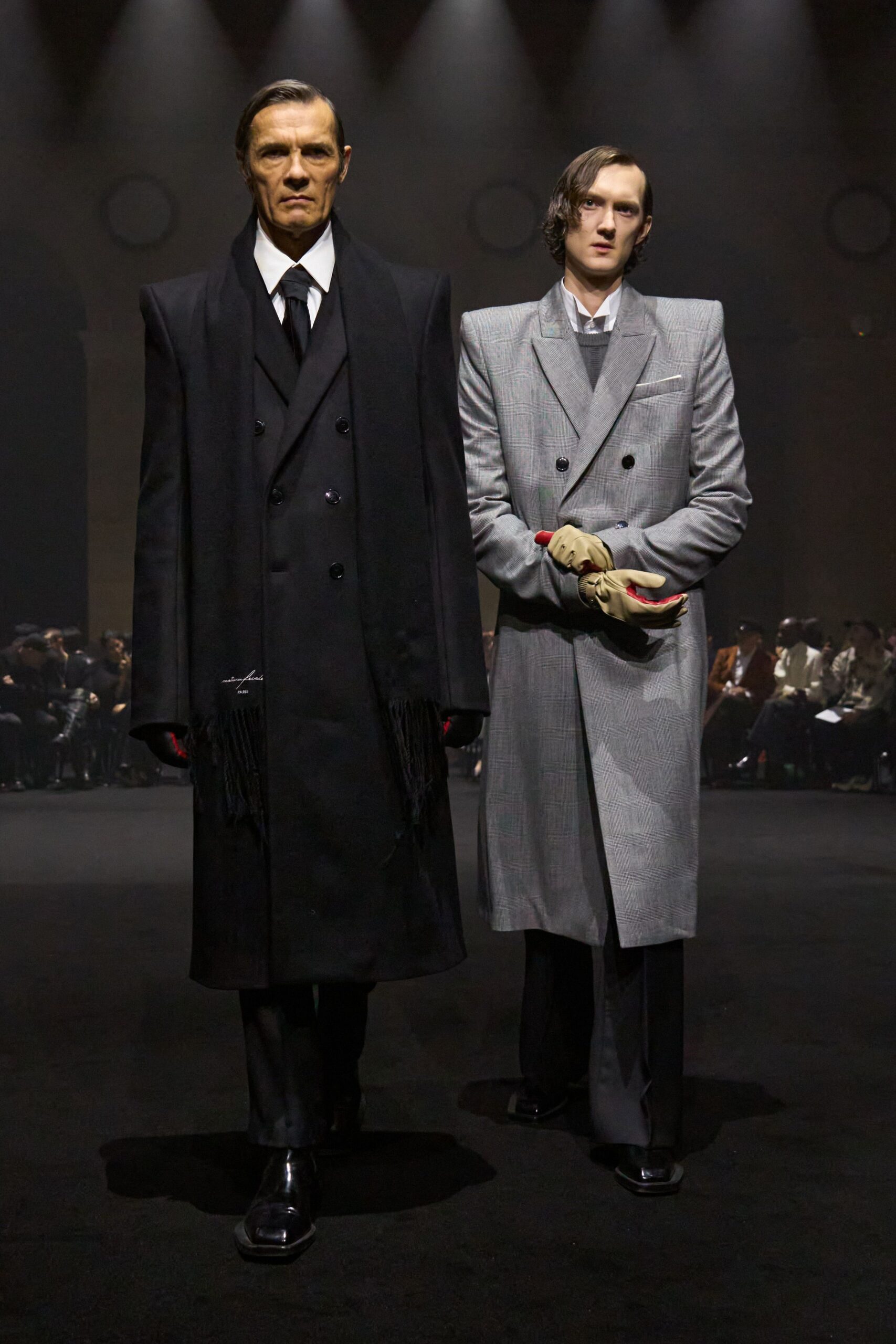 black wool long-sleeve collared structured buttoned coat
