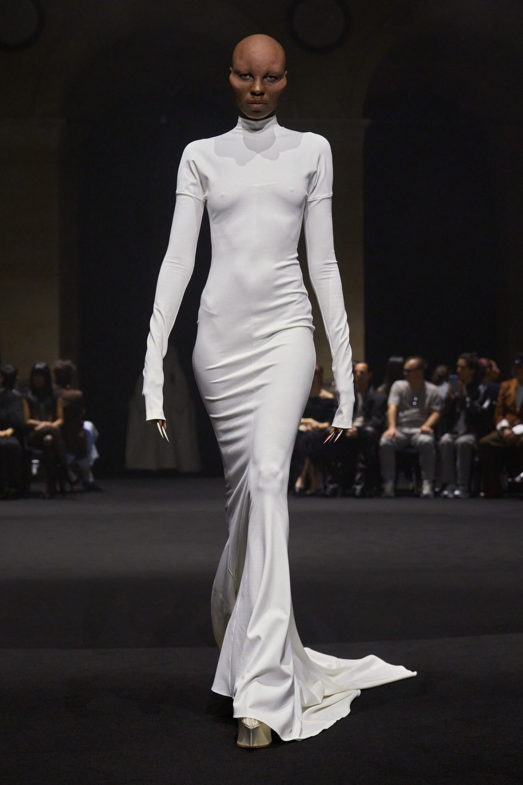 fitted white long-sleeve gown
