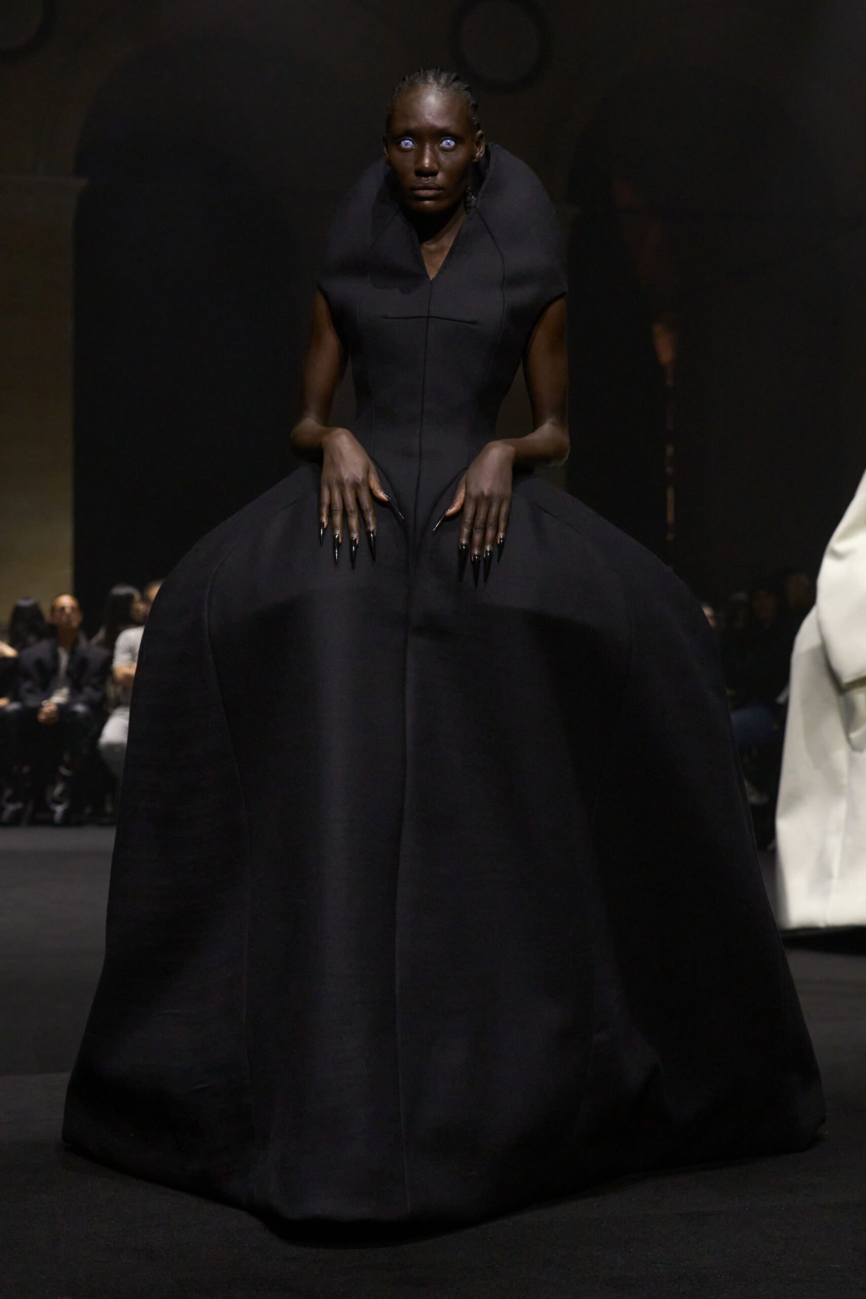 black structured sleeveless gown