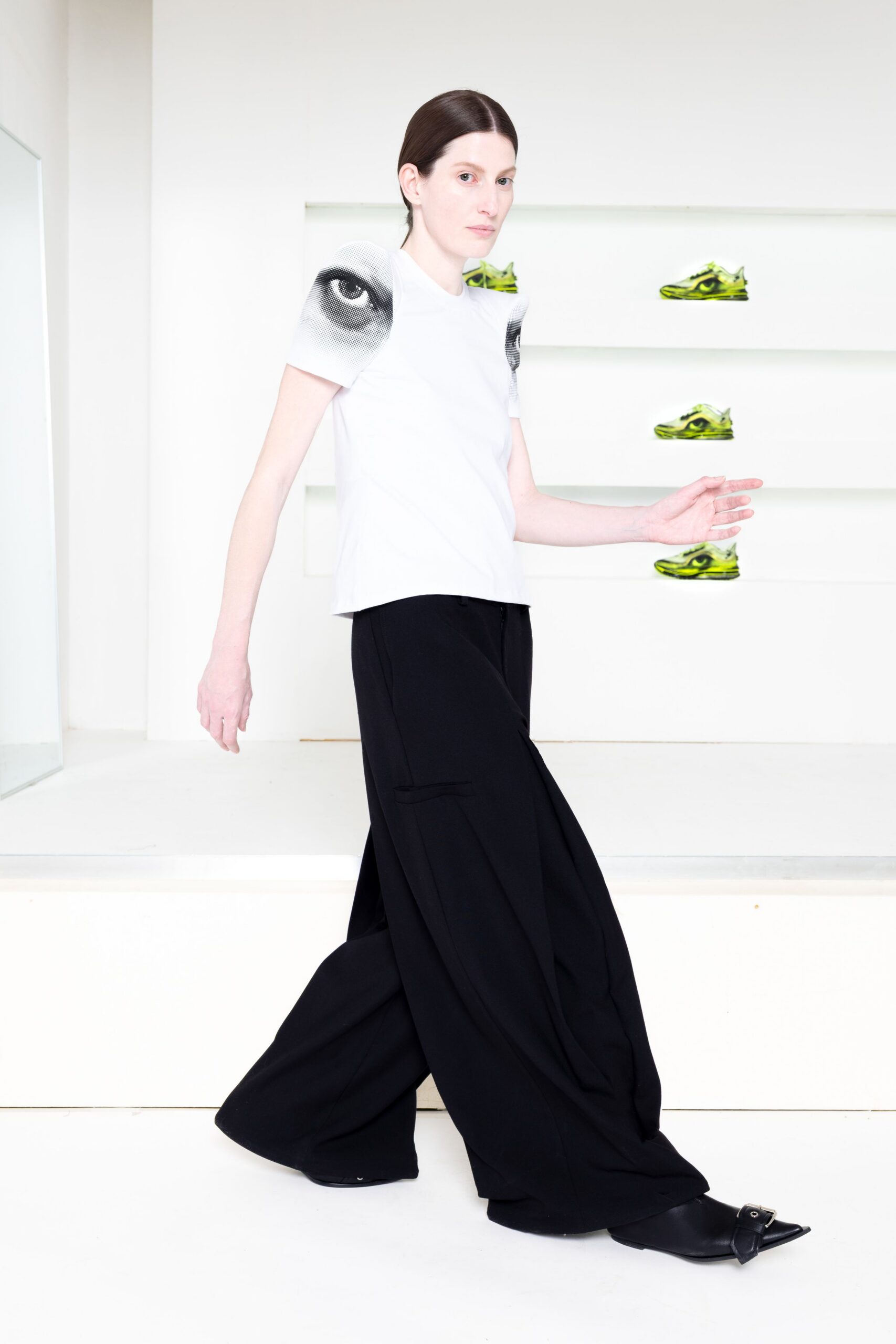 white printed t-shirt black wide-leg pants