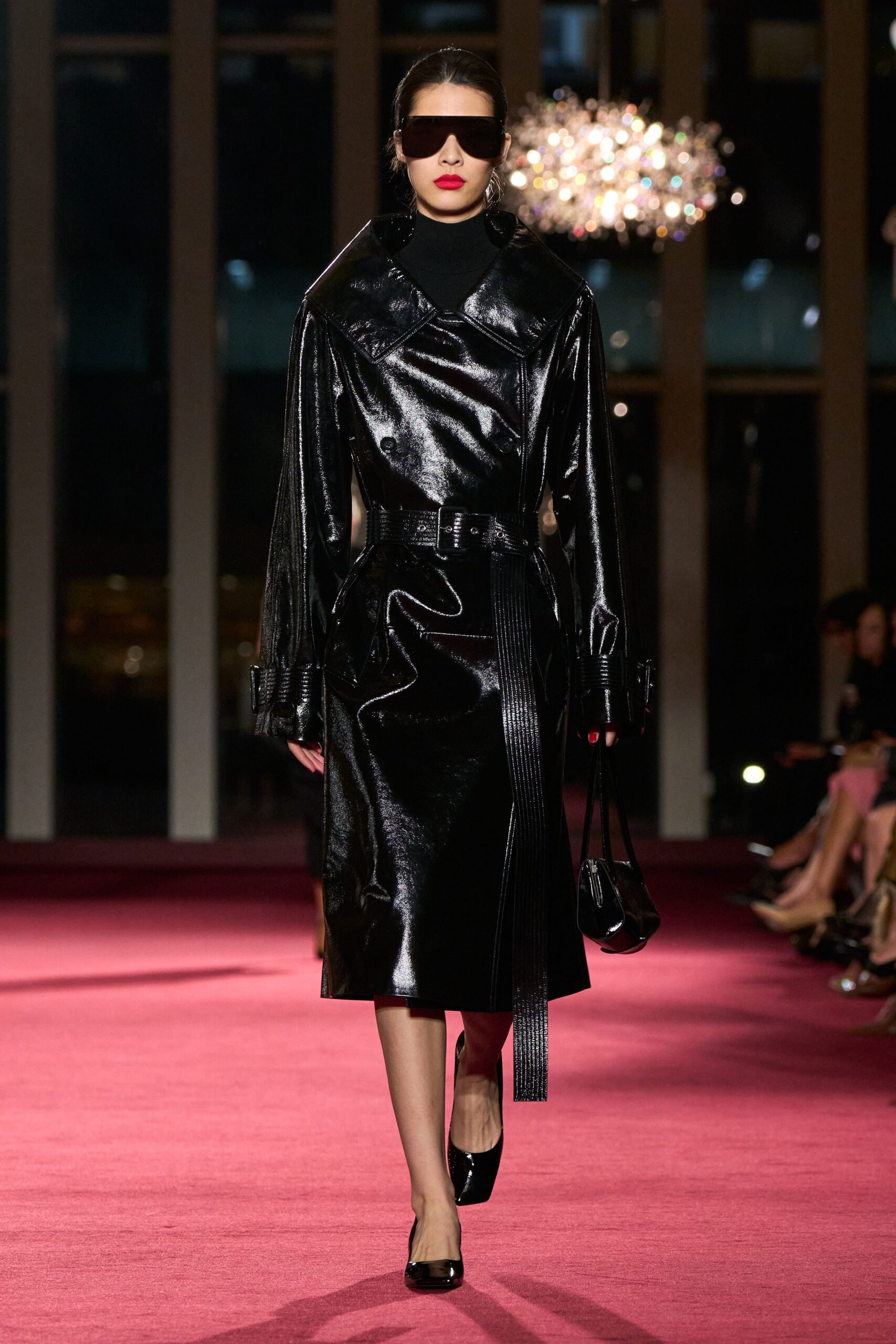black leather long-sleeve collared fitted belted zippered coat