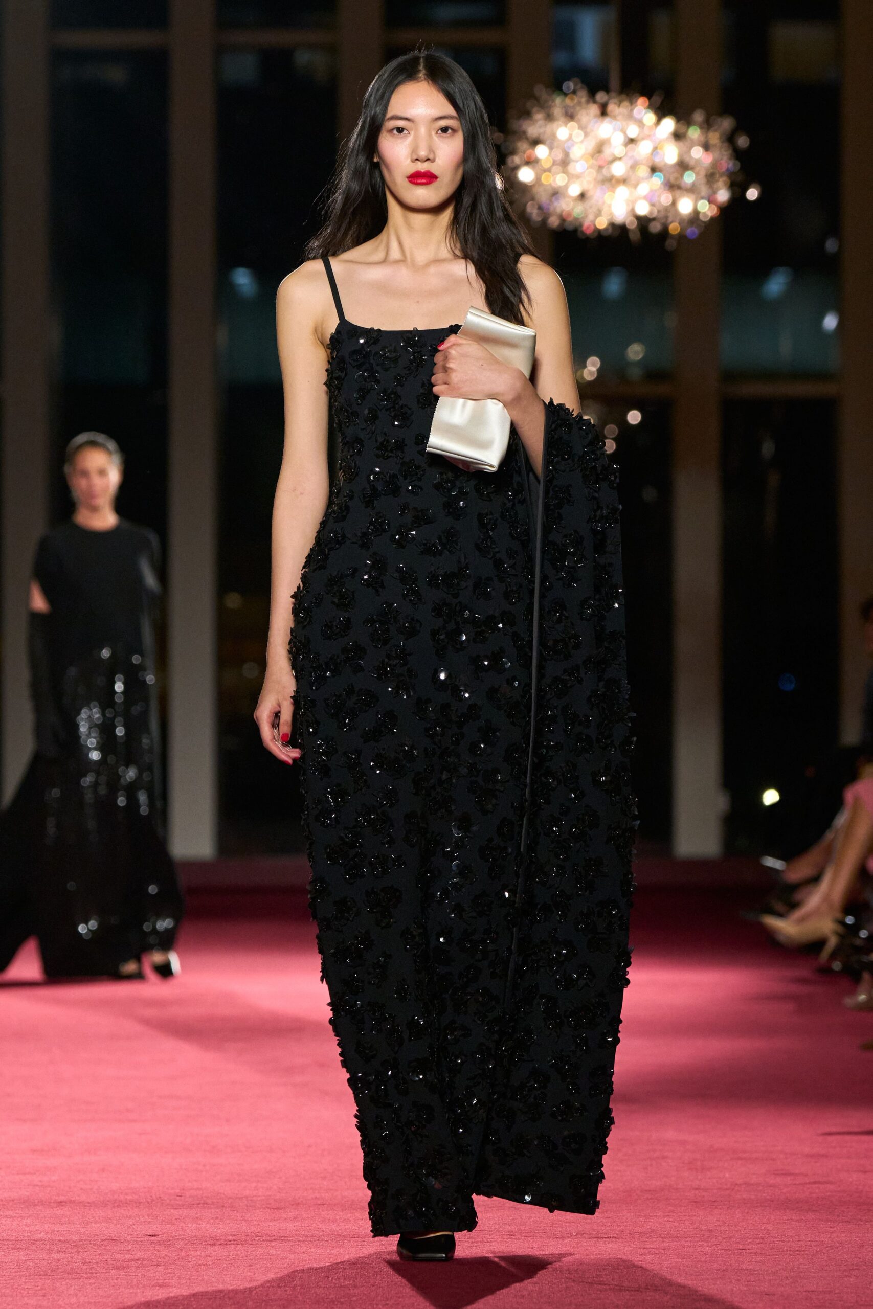 black silk sleeveless v-neck fitted embellished shiny gown