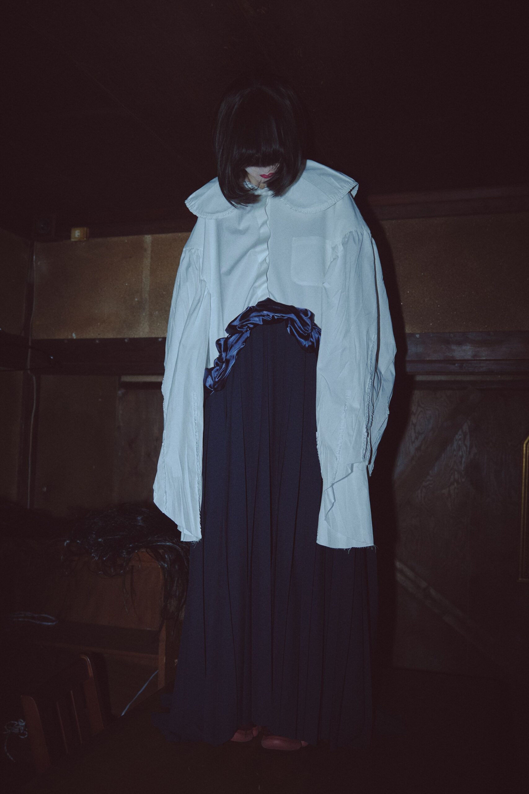 white cotton long-sleeve collared oversized buttoned shirt