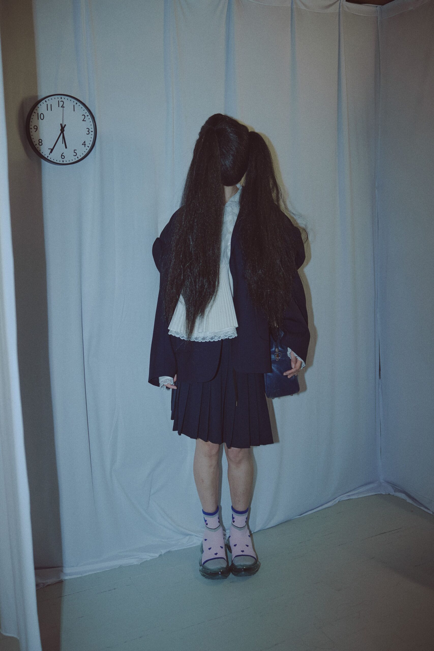 black blazer white blouse pleated skirt