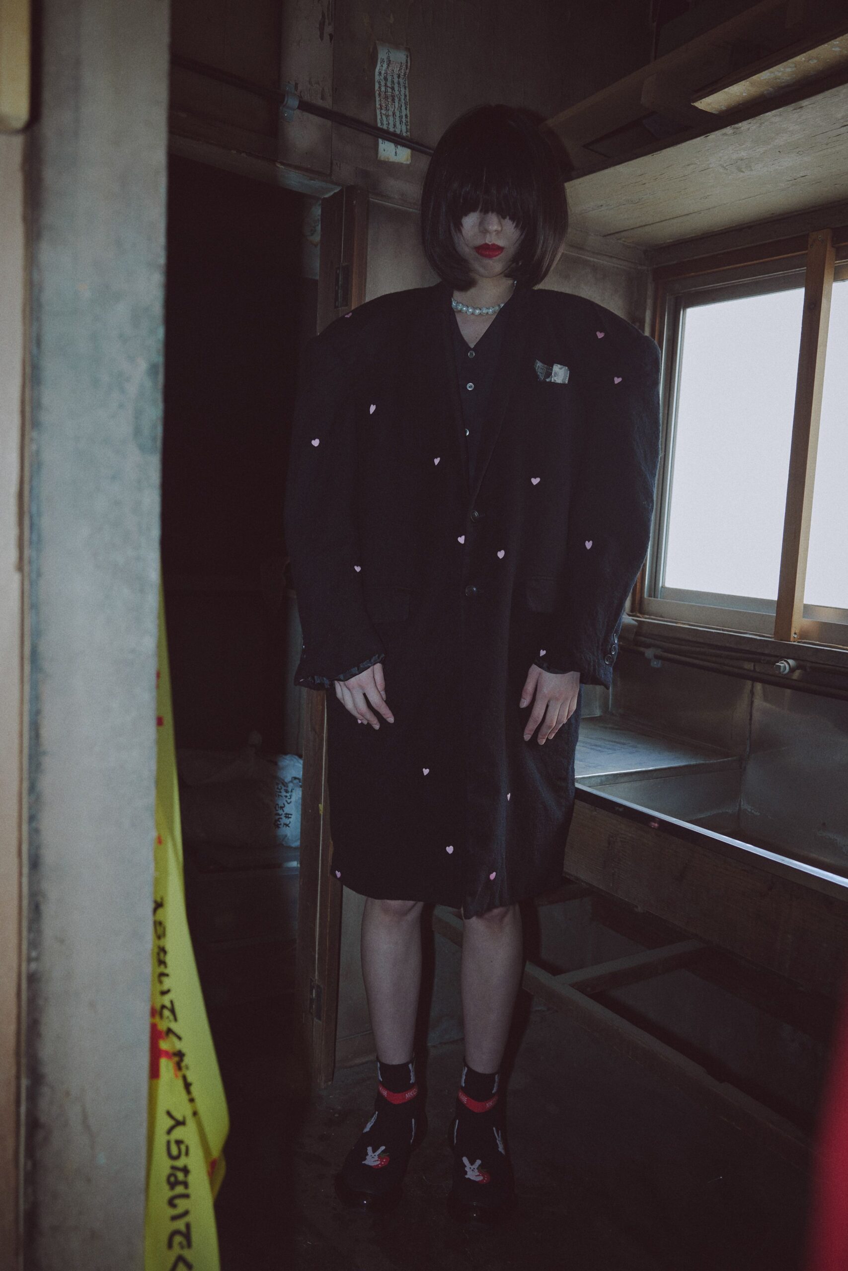 black cotton long-sleeve collared relaxed buttoned blazer