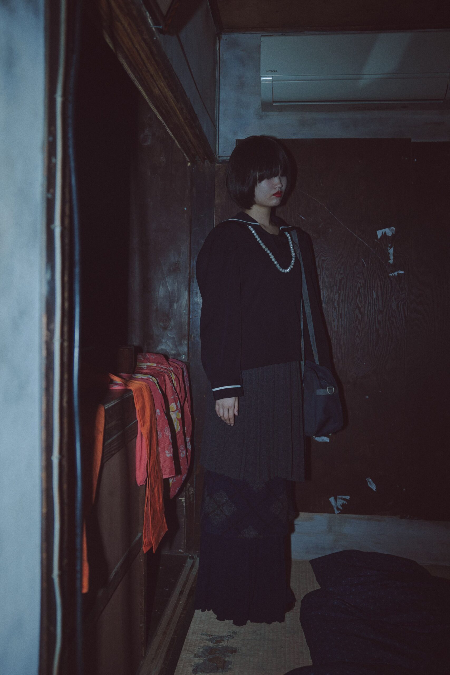 black relaxed top with pleated skirt