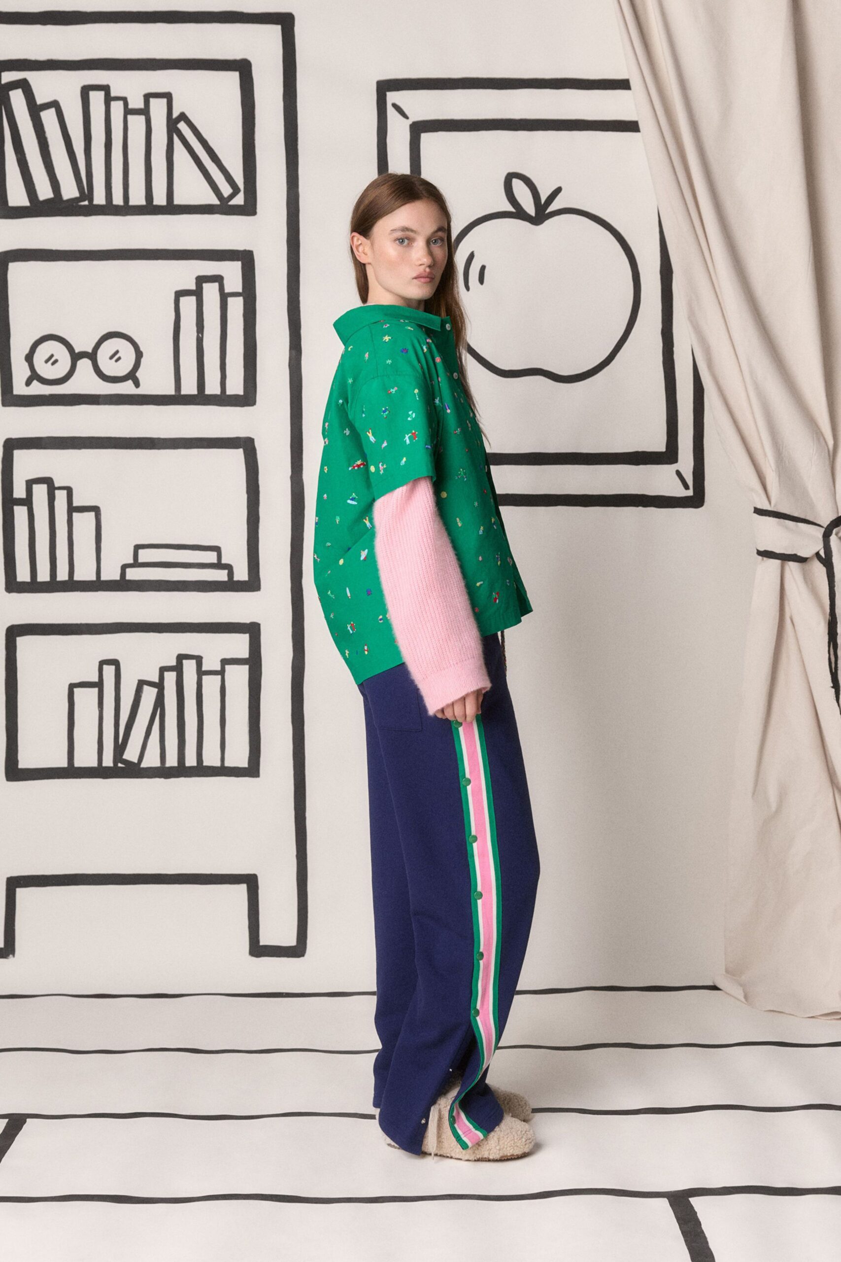 green shirt pink sweater blue pants
