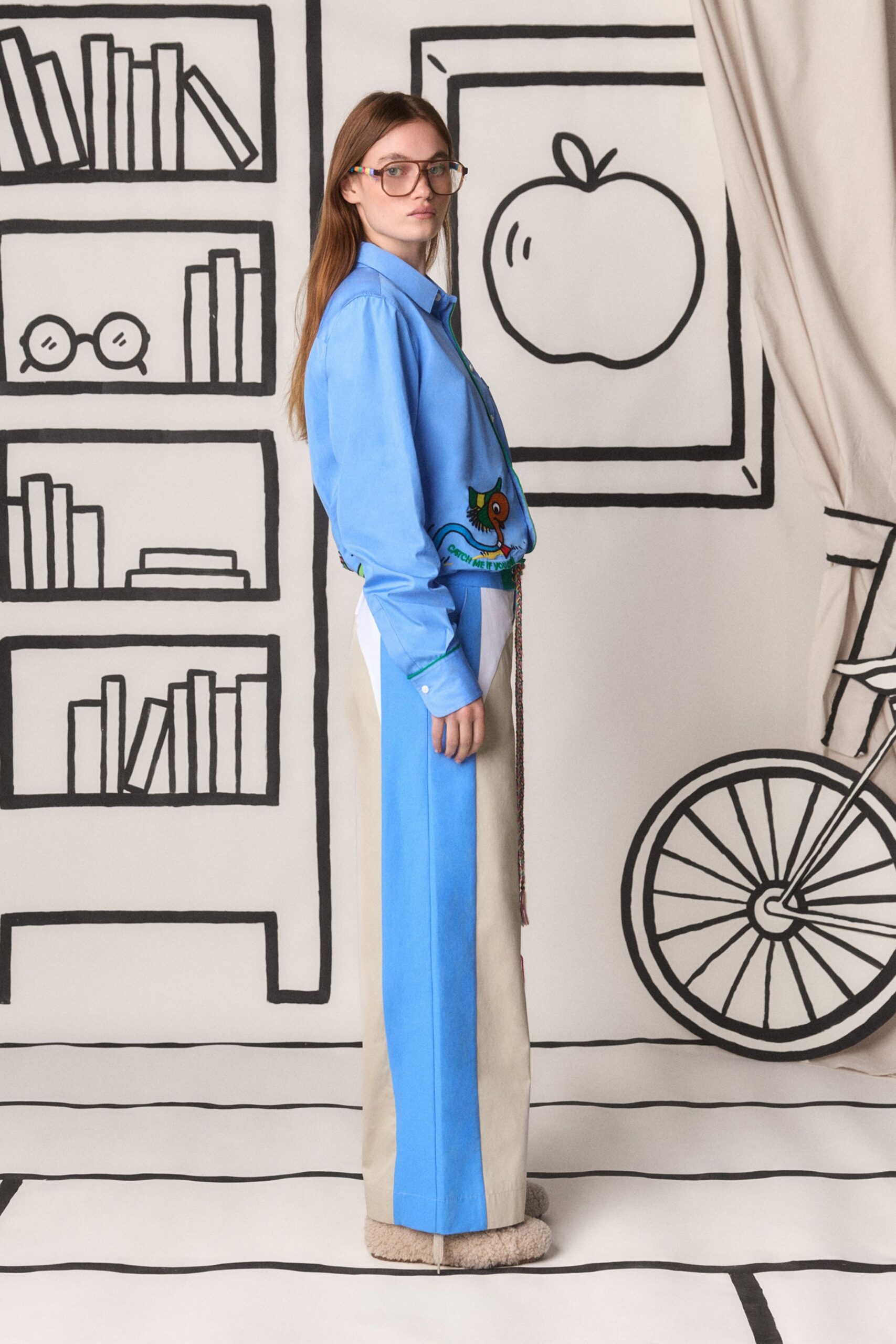 blue embroidered shirt beige pants