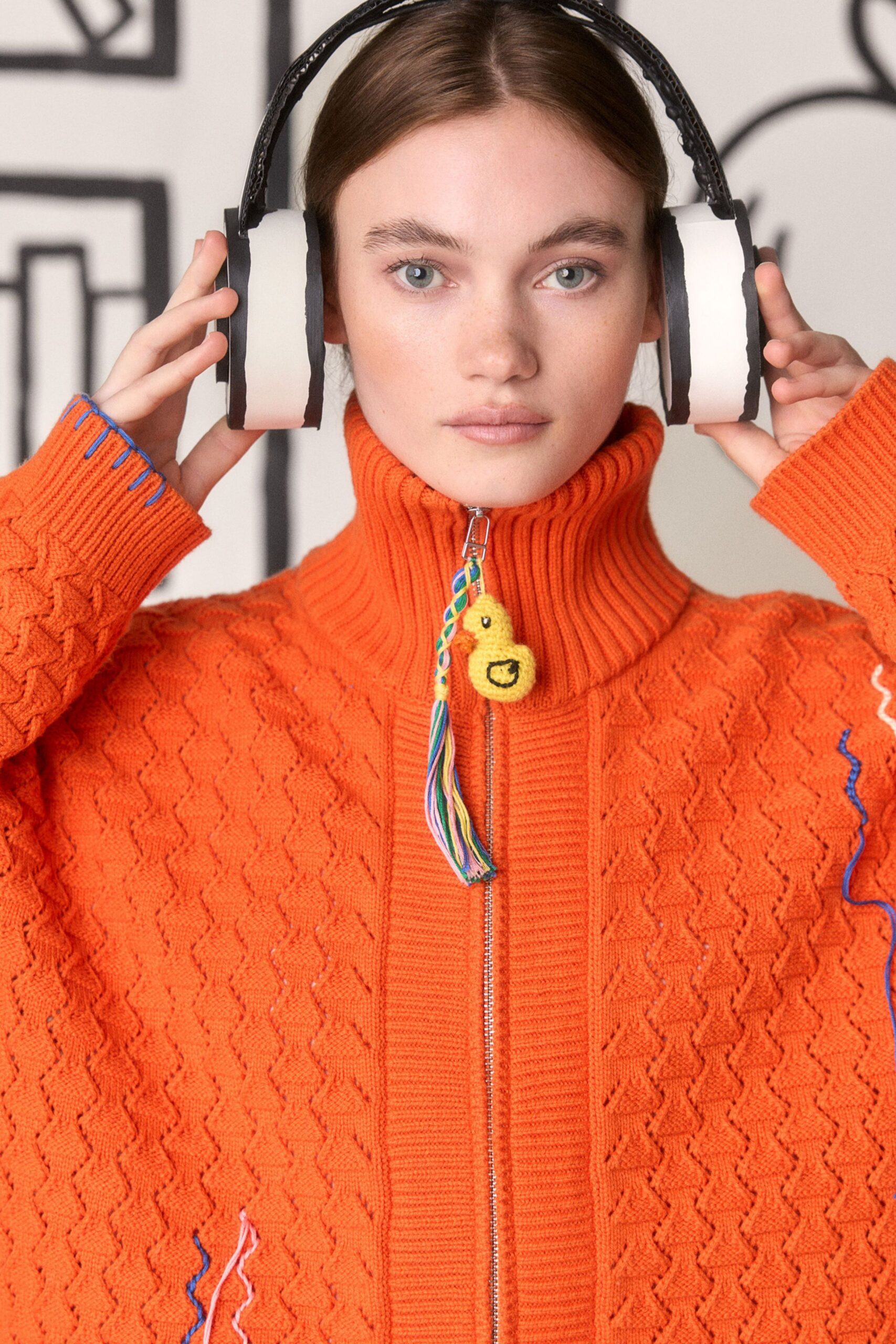 relaxed orange ribbed sweater