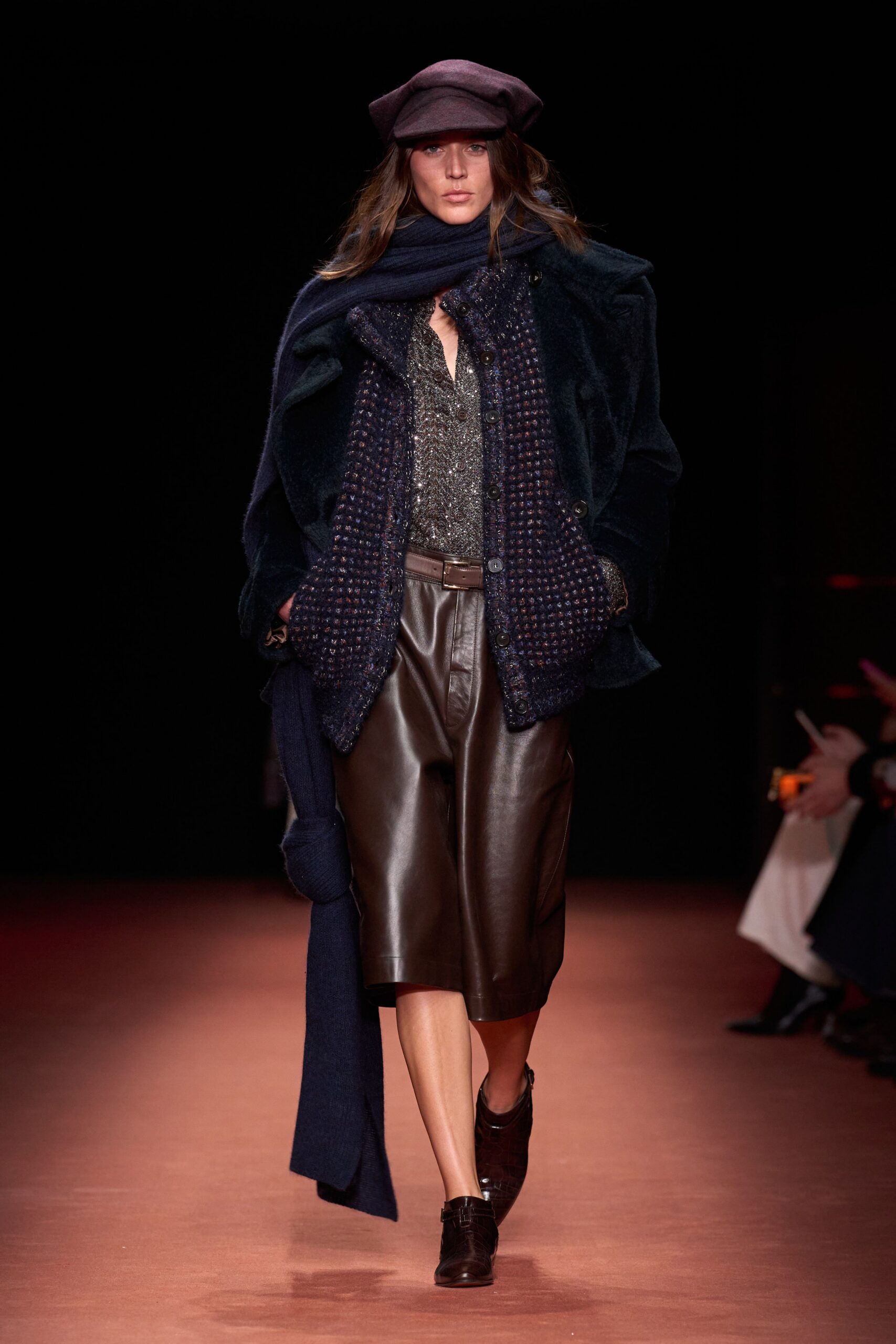 navy faux-fur coat with leather shorts
