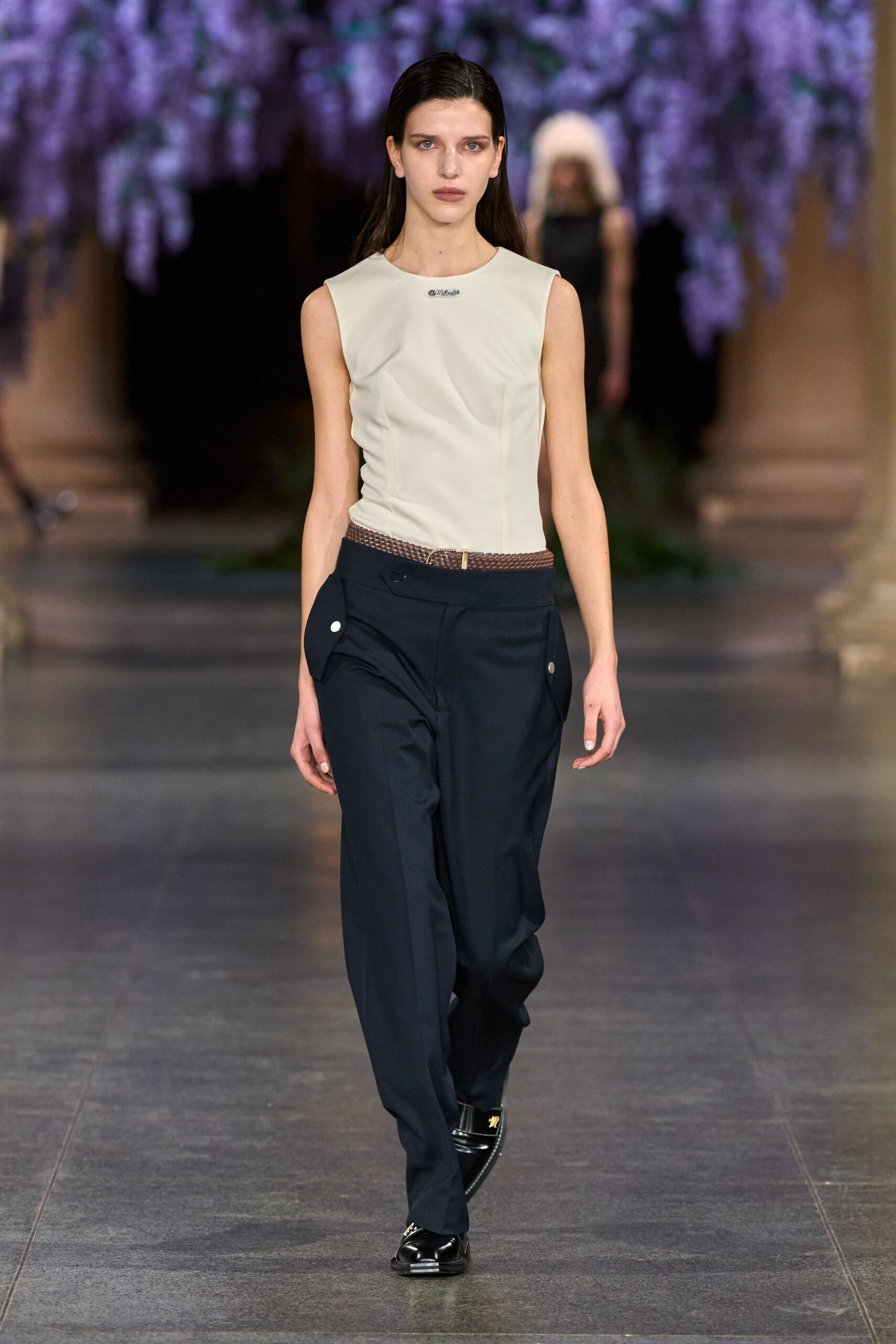 beige fitted top with navy pants