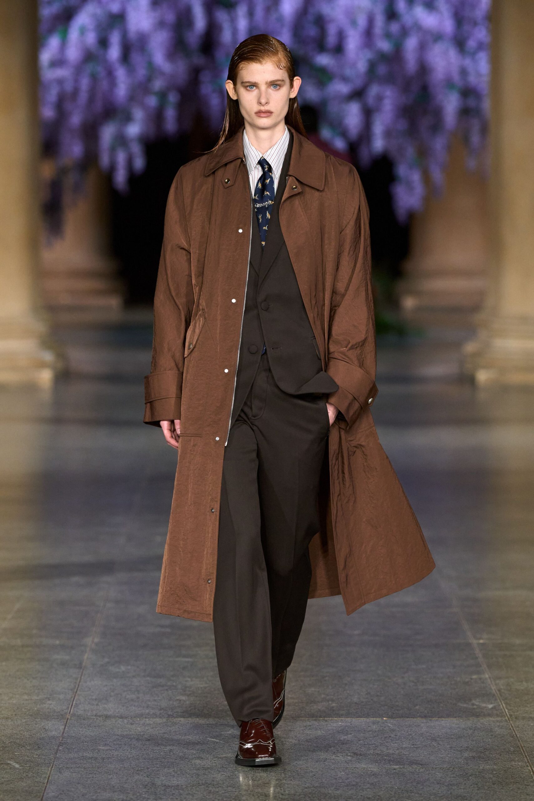 brown coat black suit brown shoes