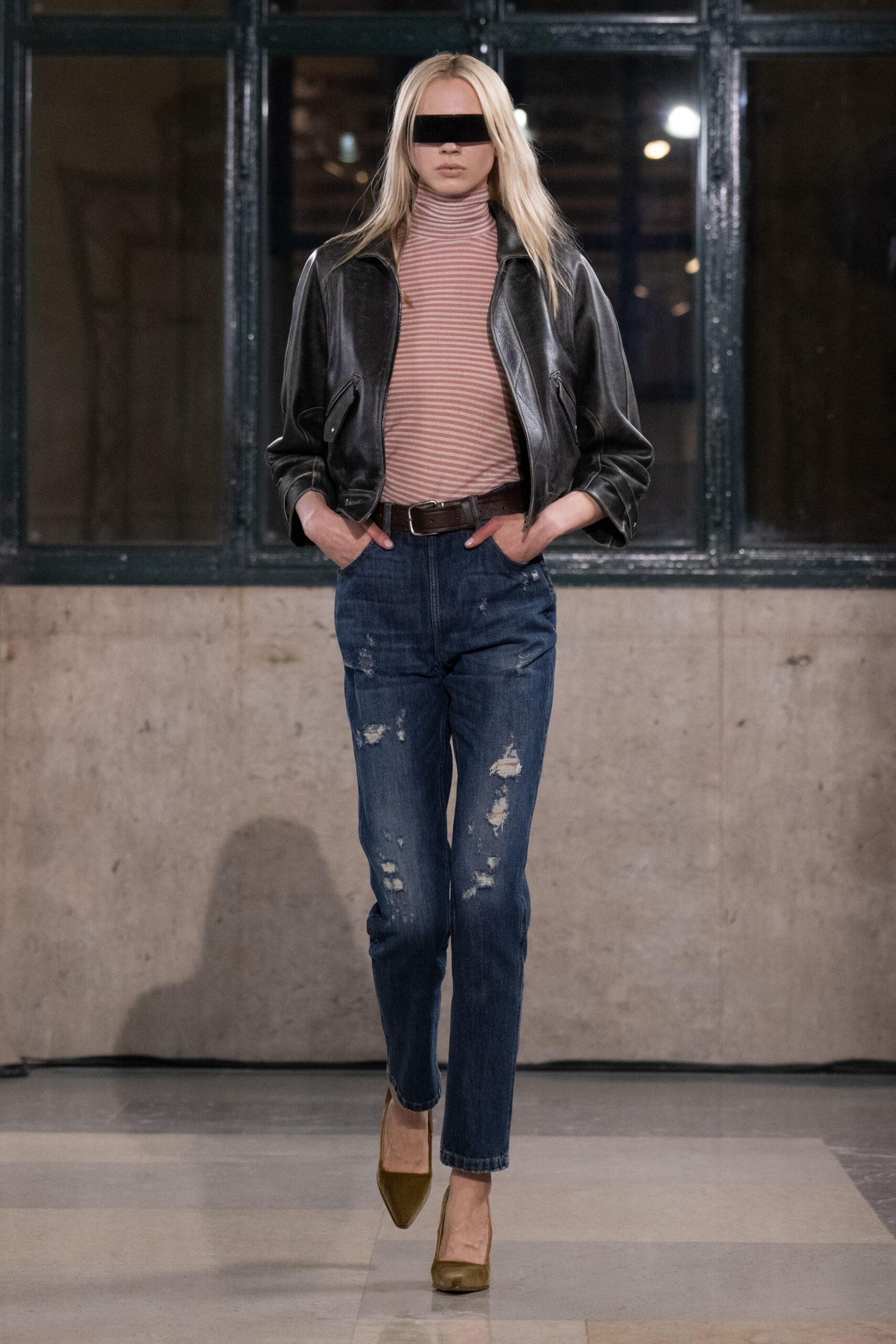 black leather jacket with pink striped top