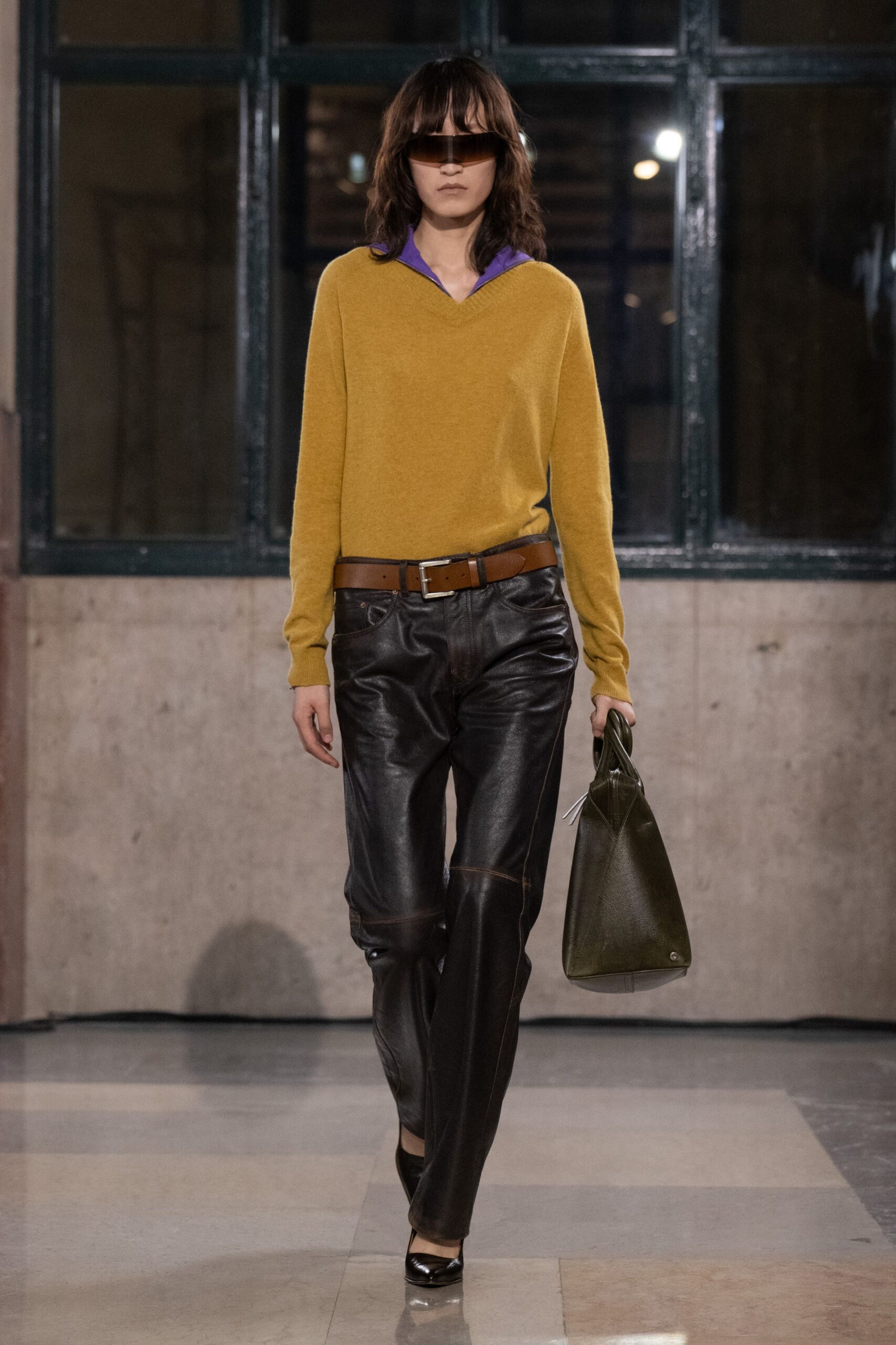 yellow wool sweater black leather pants