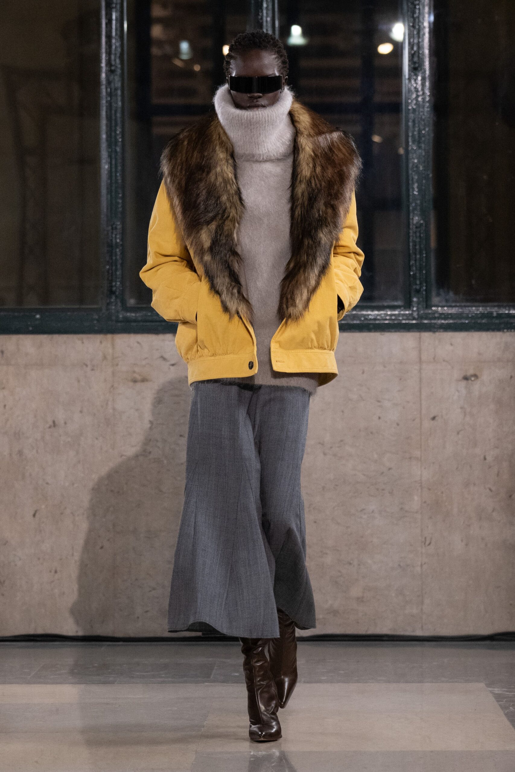 yellow faux-fur jacket with gray sweater and wide-leg pants