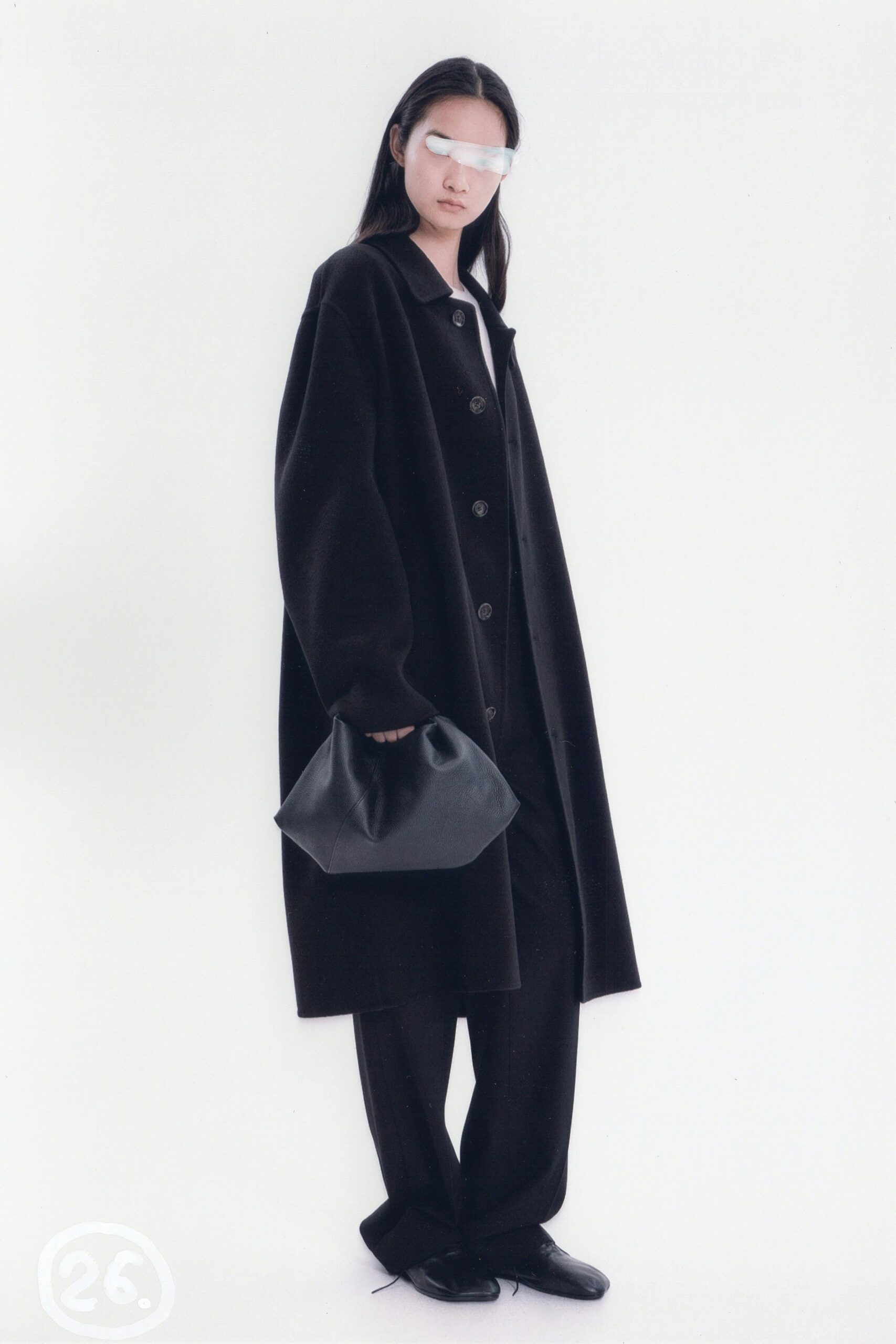 black wool long-sleeve collared oversized buttoned coat