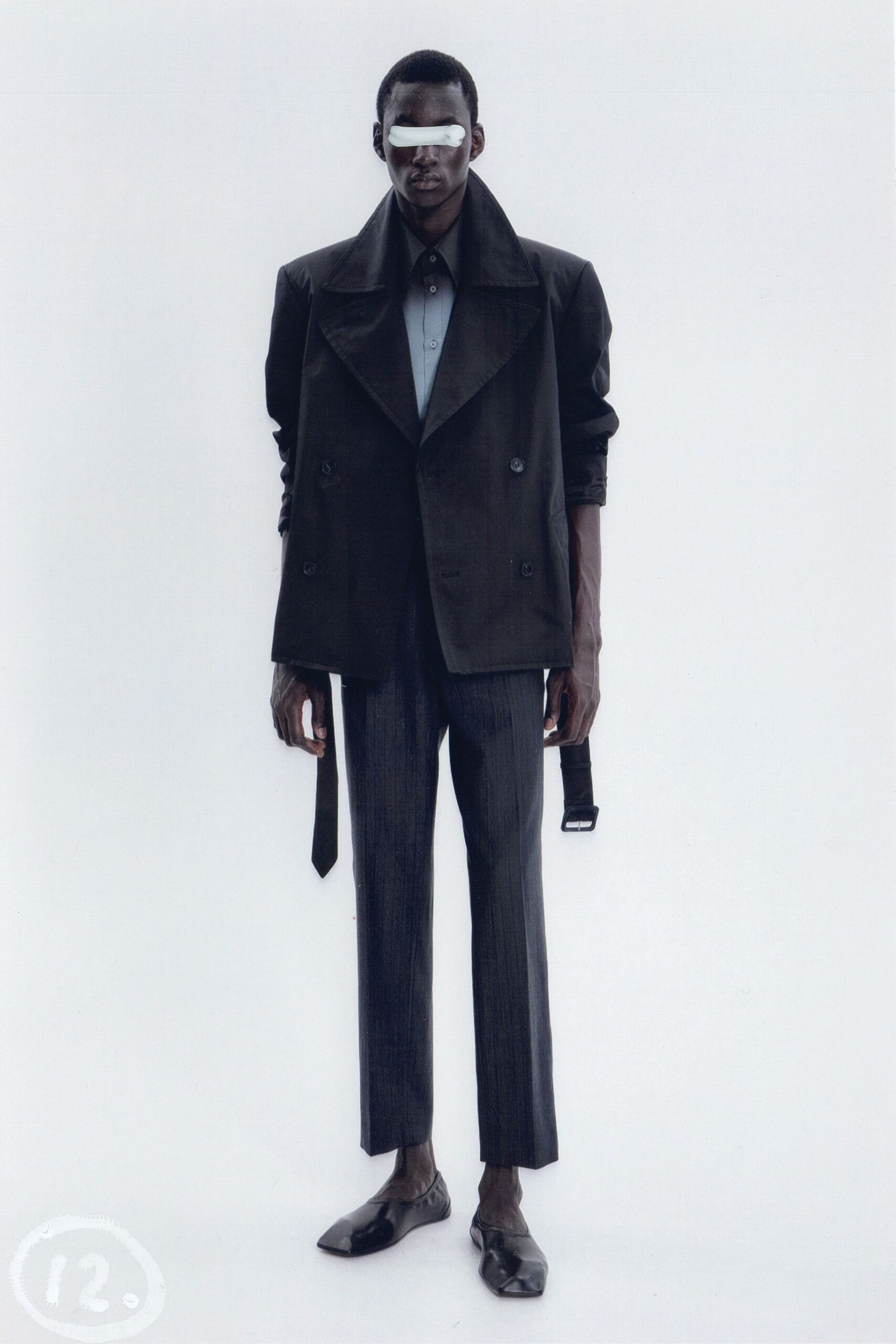 black cotton long-sleeve collared structured buttoned jacket