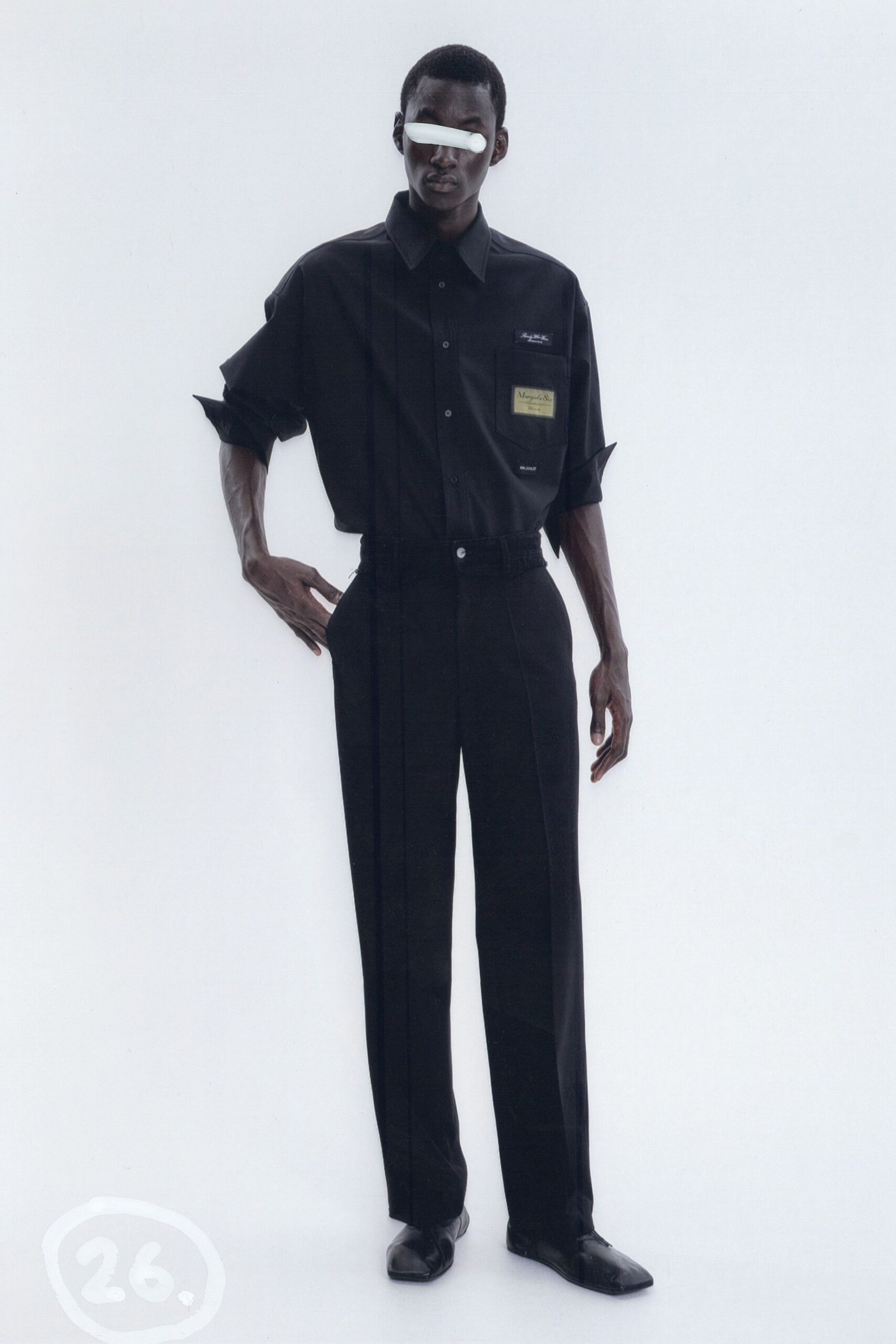 black relaxed shirt with tailored pants