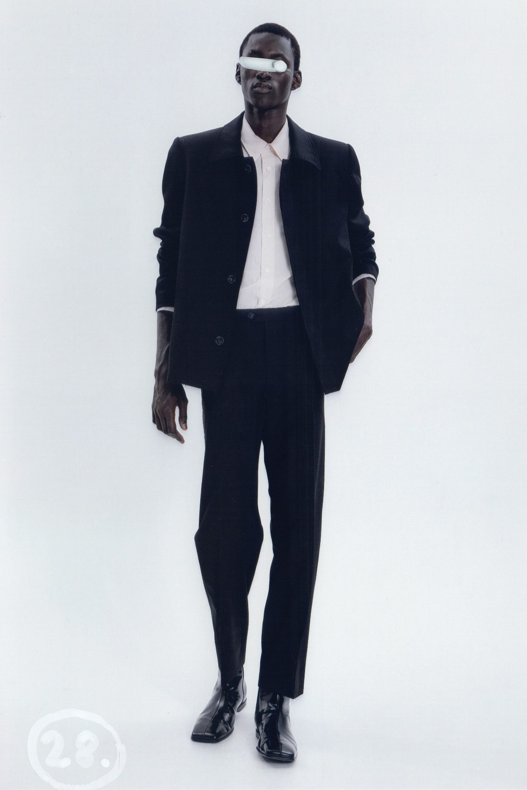 black cotton long-sleeve collared structured buttoned jacket