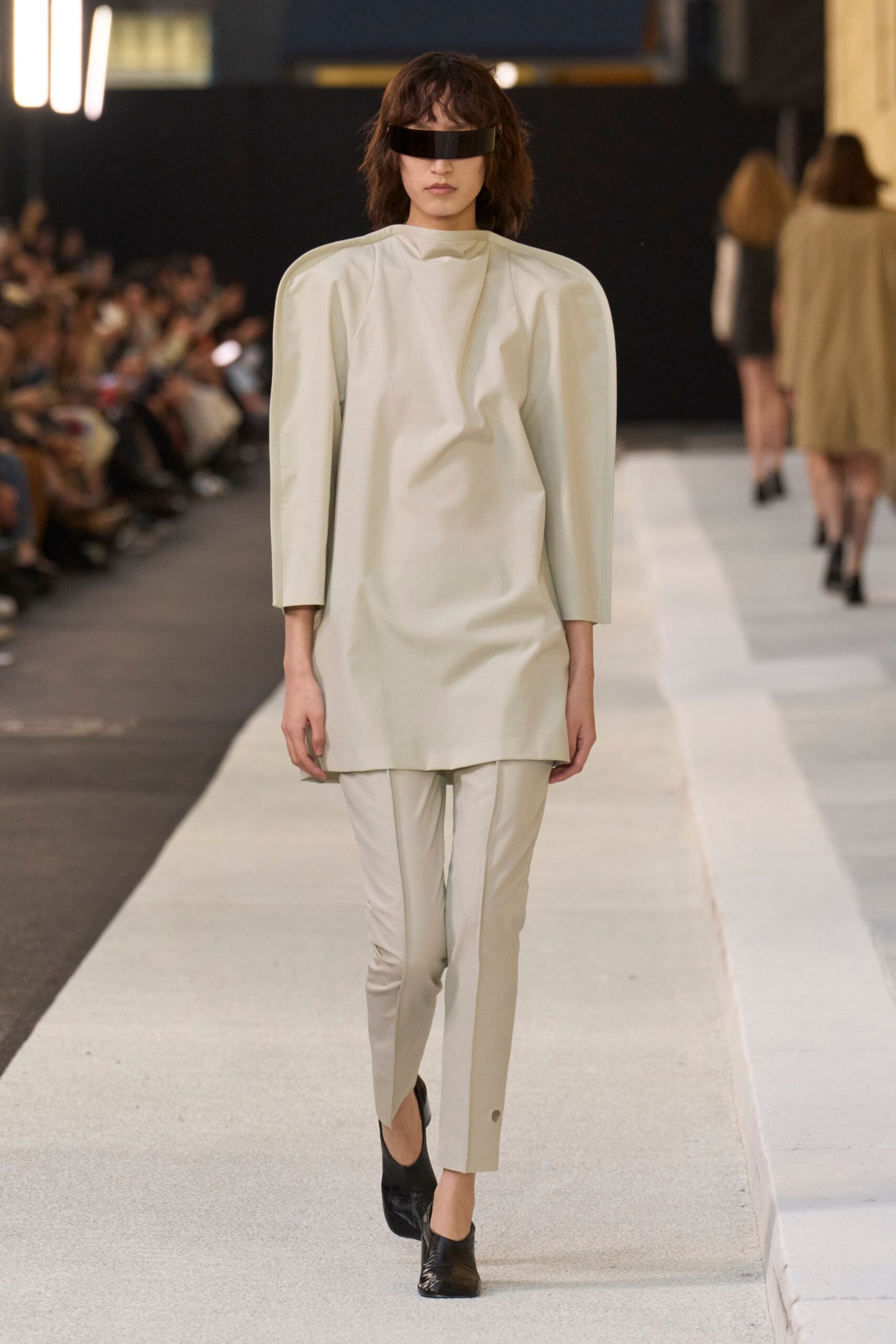 beige leather long-sleeve high-neck relaxed structured top