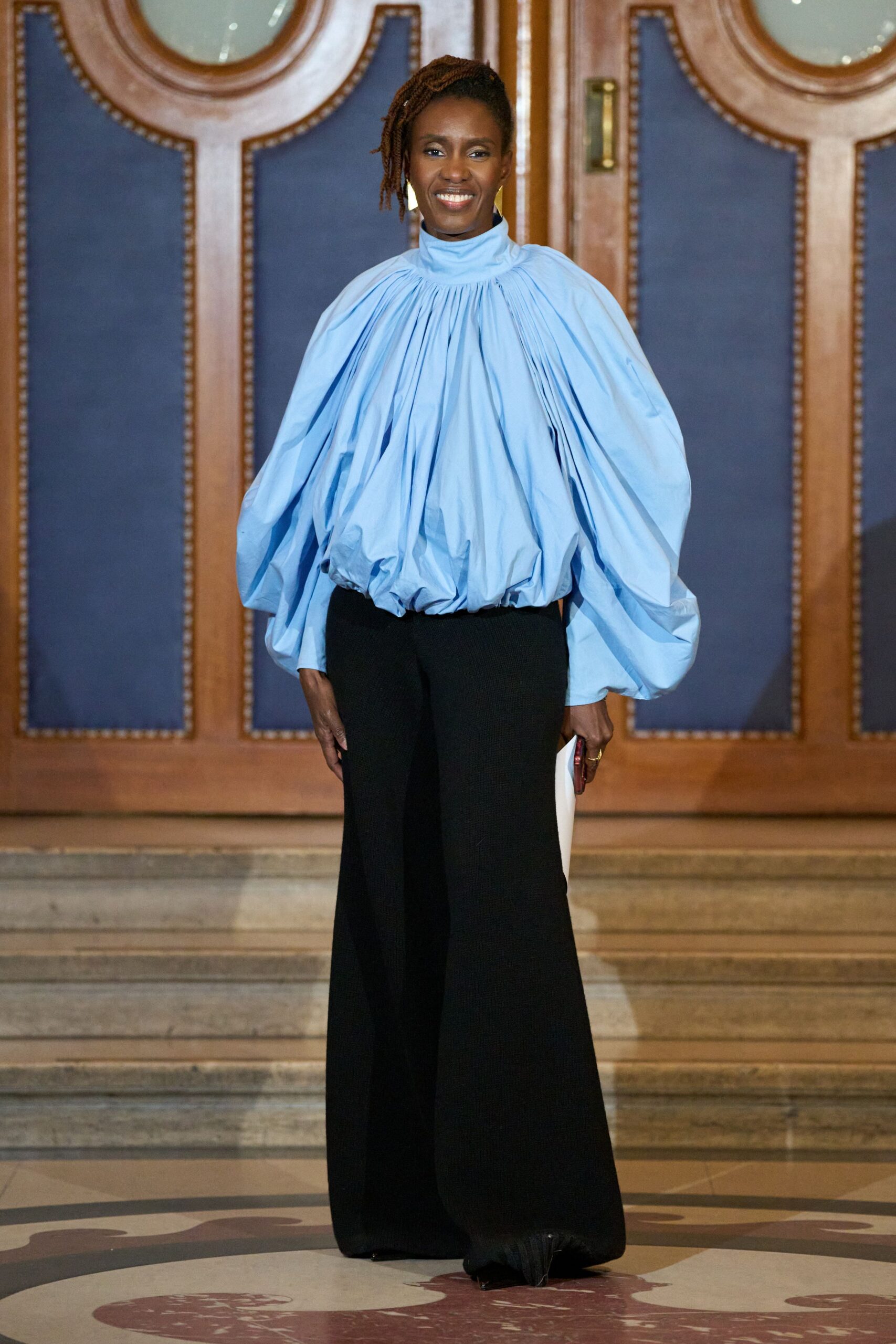 blue cotton long-sleeve collared relaxed pleated top