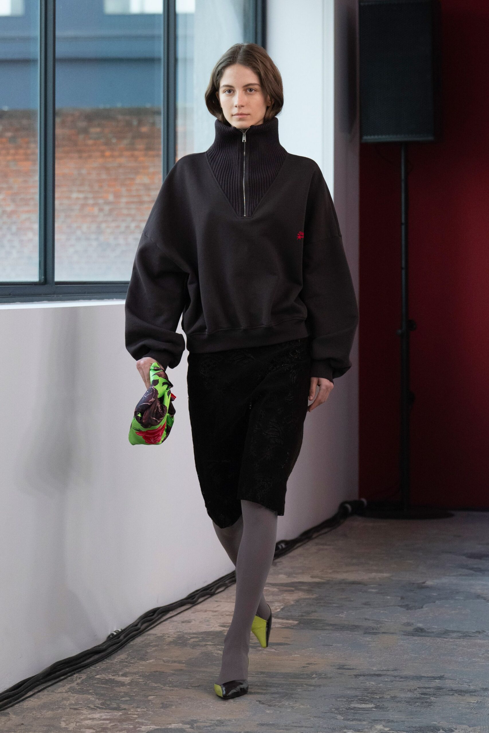 black oversized hoodie with pencil skirt