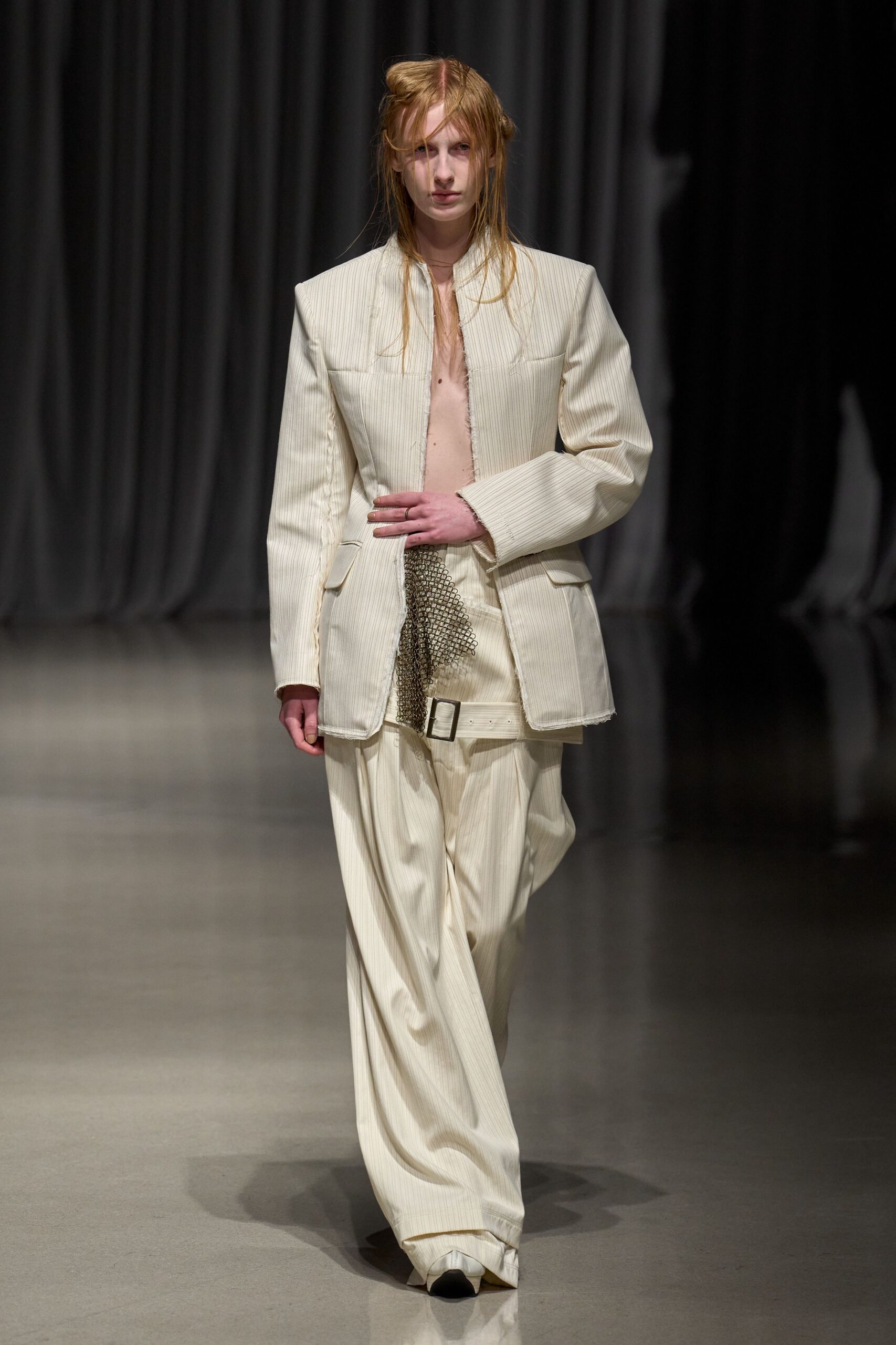 white relaxed suit with pleats