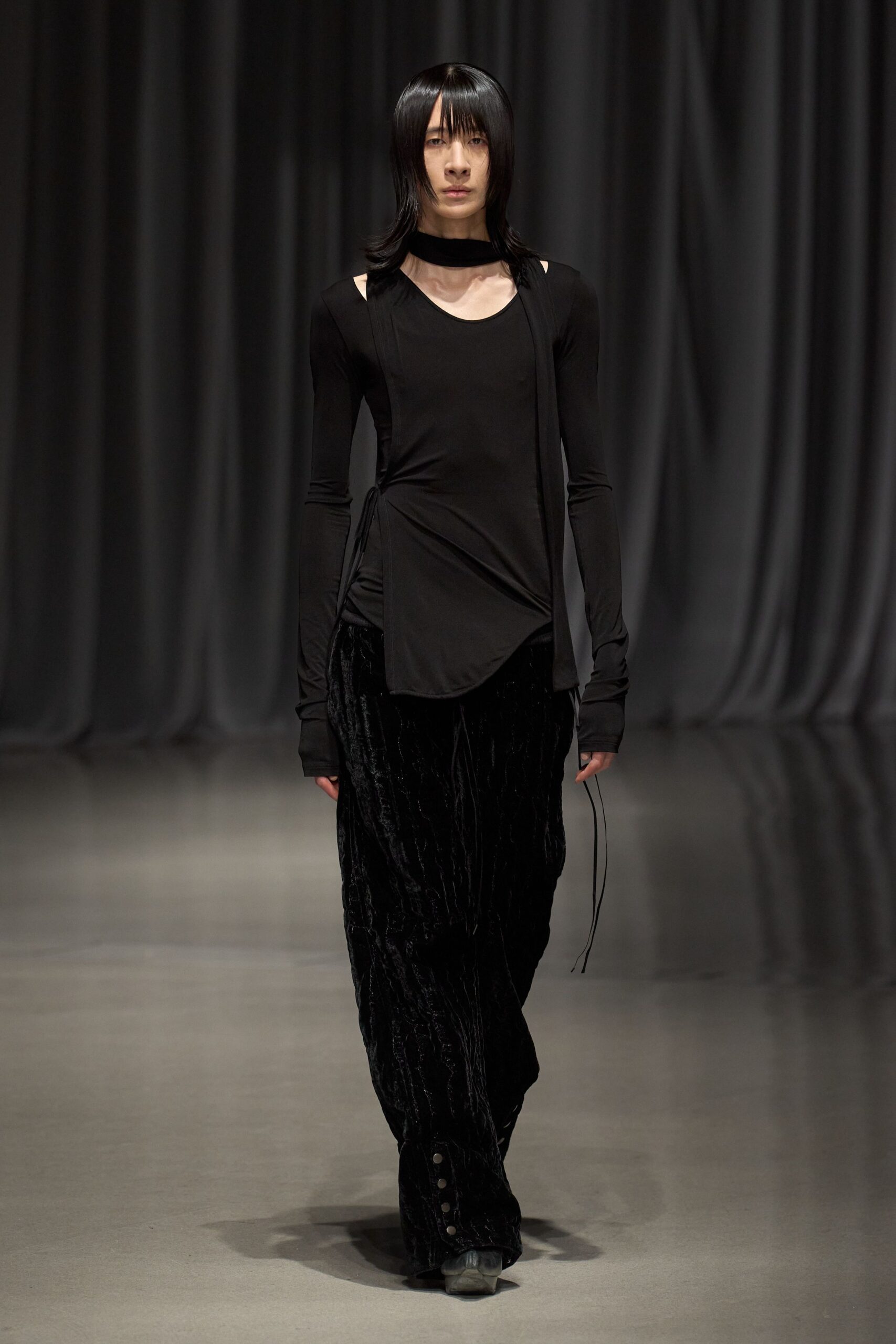 black fitted top and relaxed pants