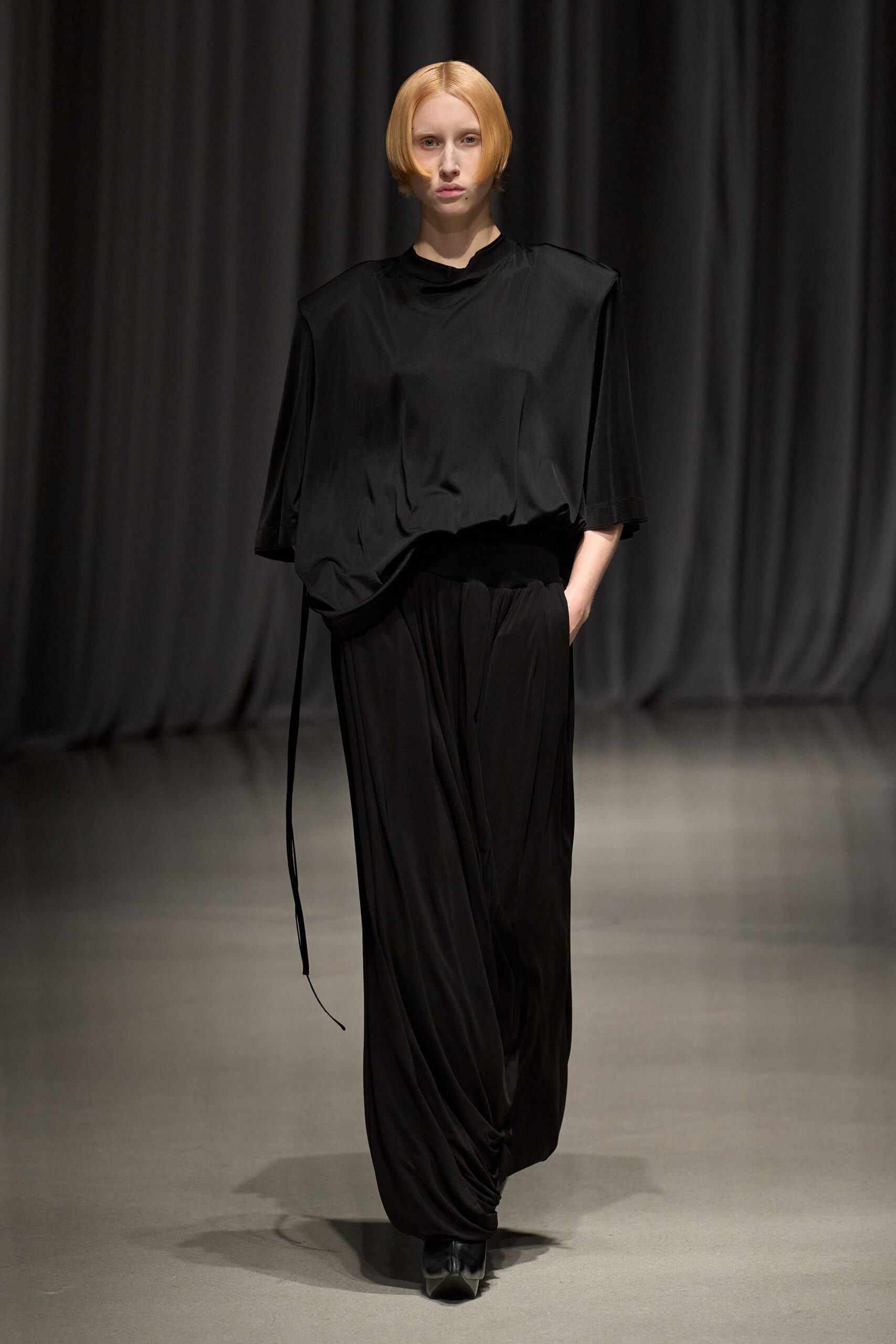 black silk relaxed top and fitted pants