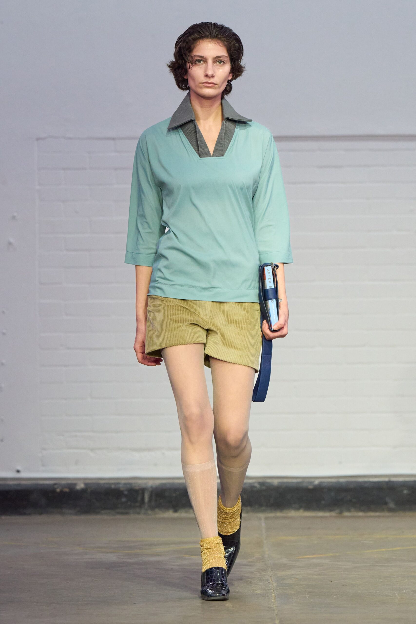 yellow cotton fitted high-waisted pleated shorts