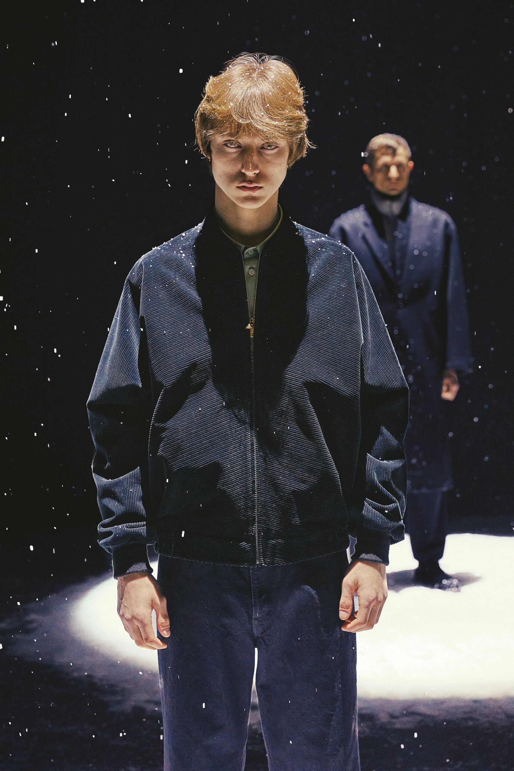 black fitted jacket and relaxed pants