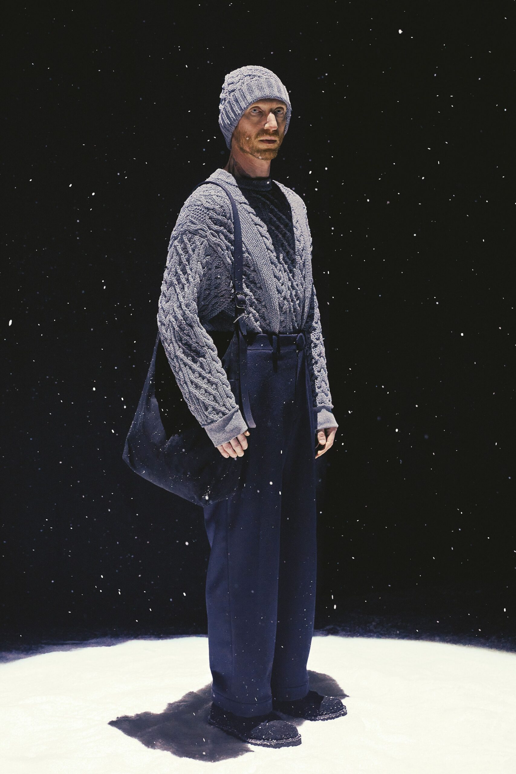 gray wool sweater and navy pants