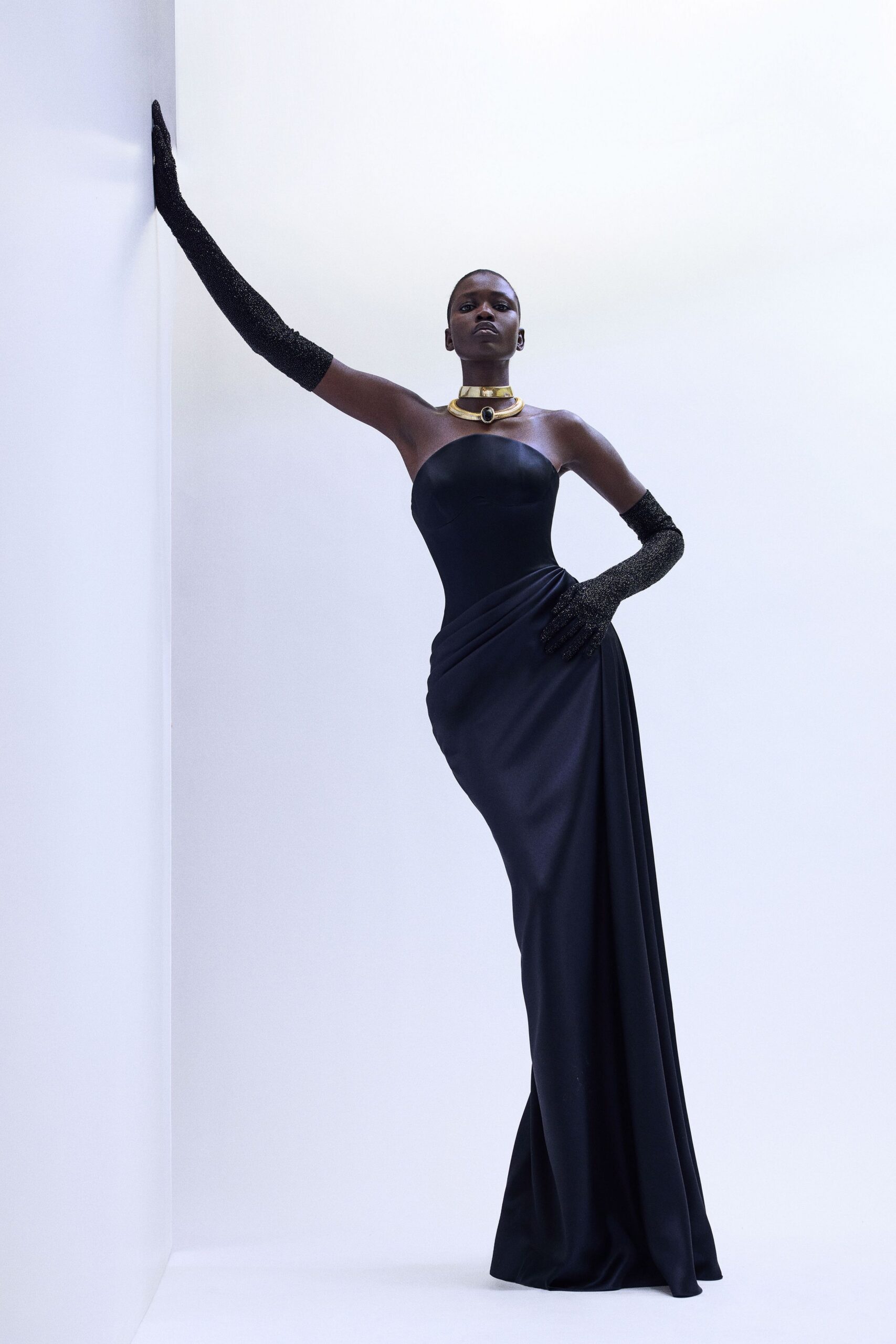 black silk strapless fitted draped maxi gown