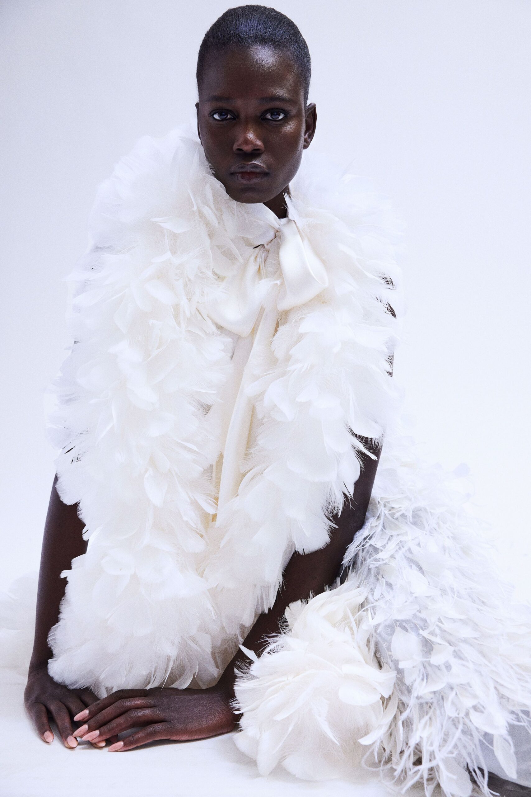 white feathered maxi gown