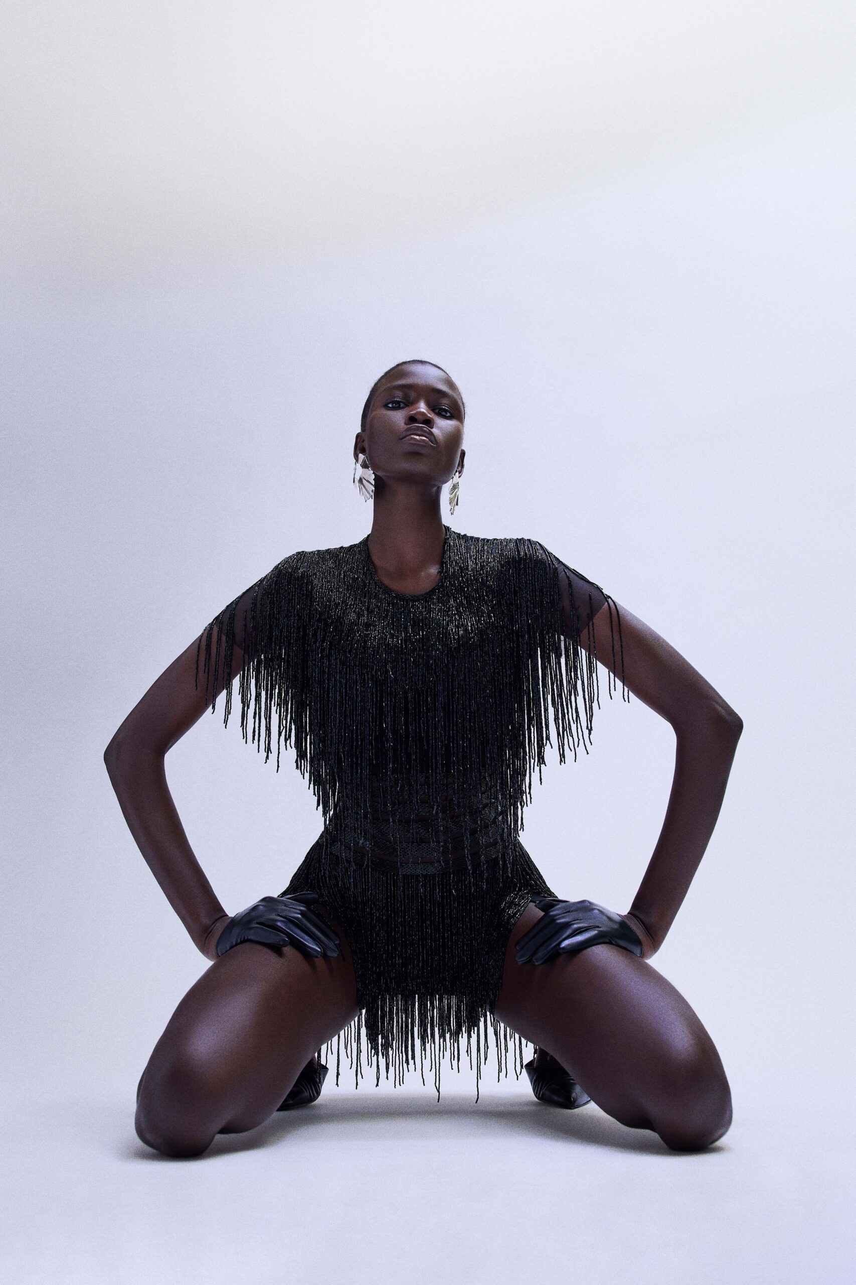 black sequin sleeveless fitted fringed shiny romper