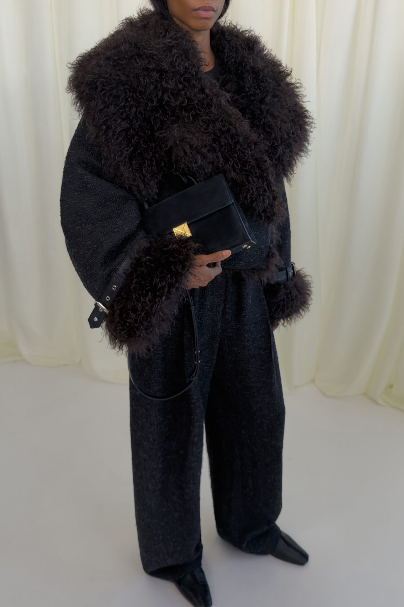 black wool long-sleeve collared relaxed fringed coat