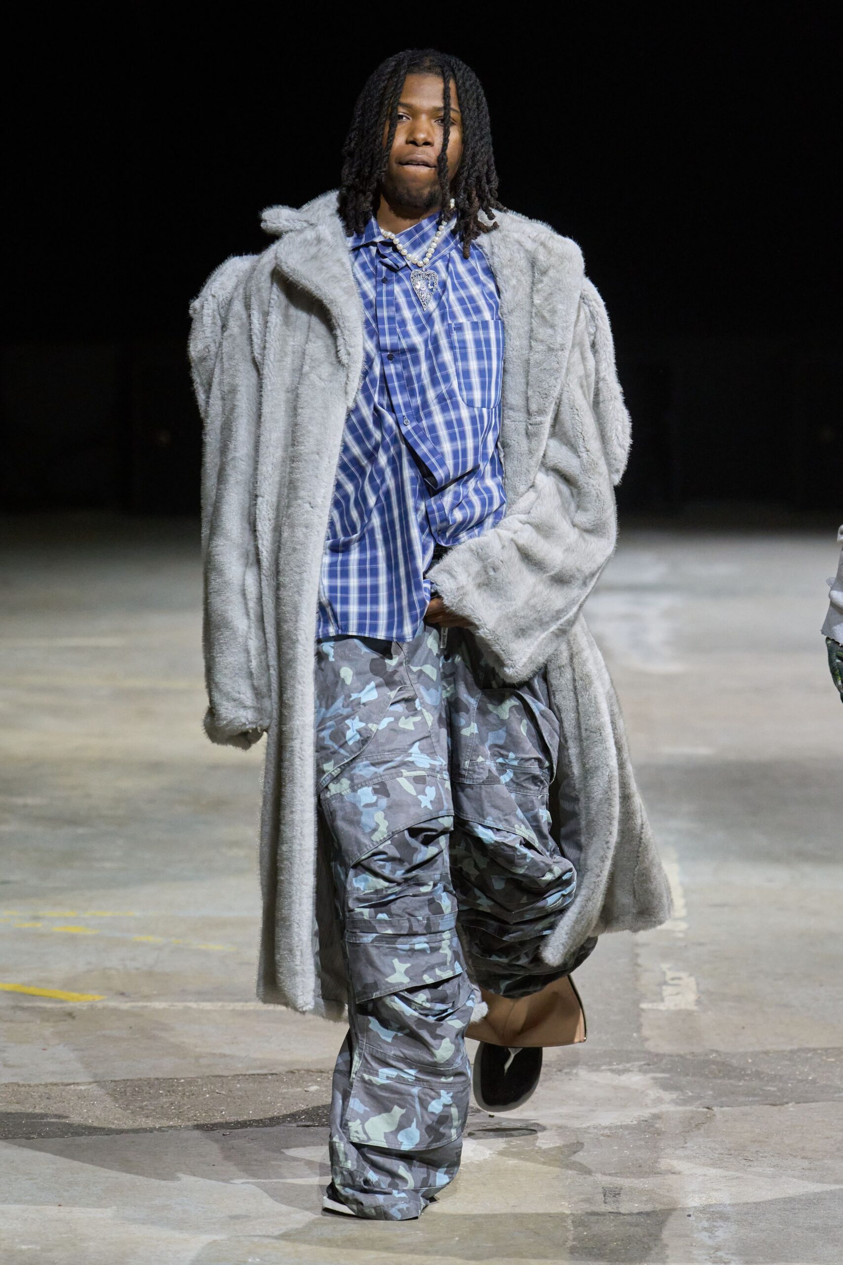 gray faux-fur coat with checked shirt