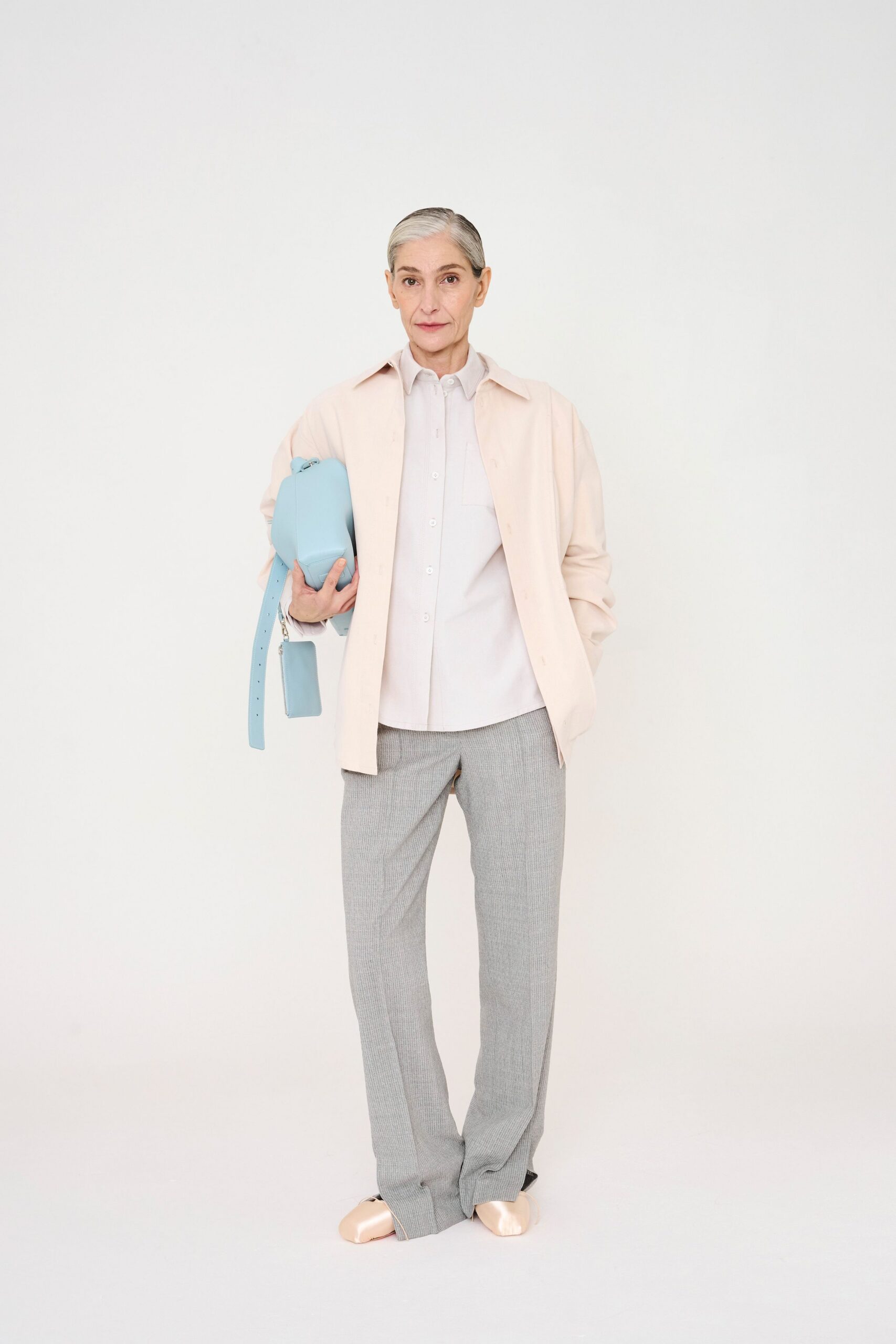 beige oversized jacket with gray pants