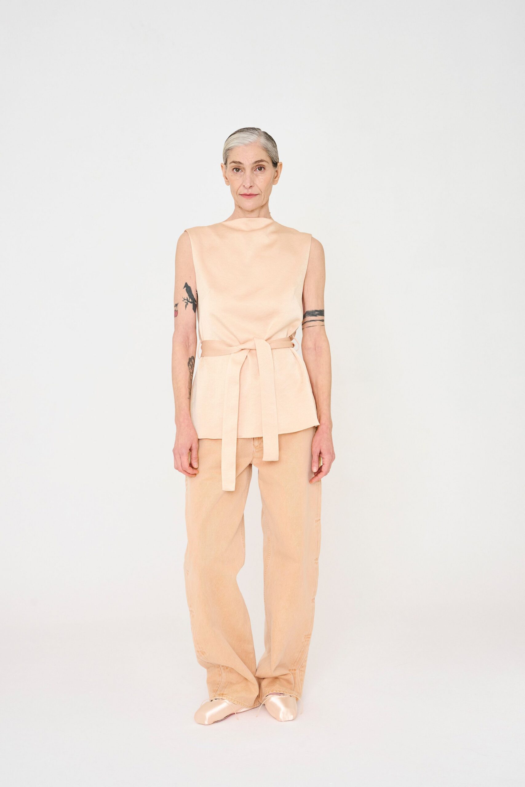 beige cotton sleeveless high-neck fitted belted top