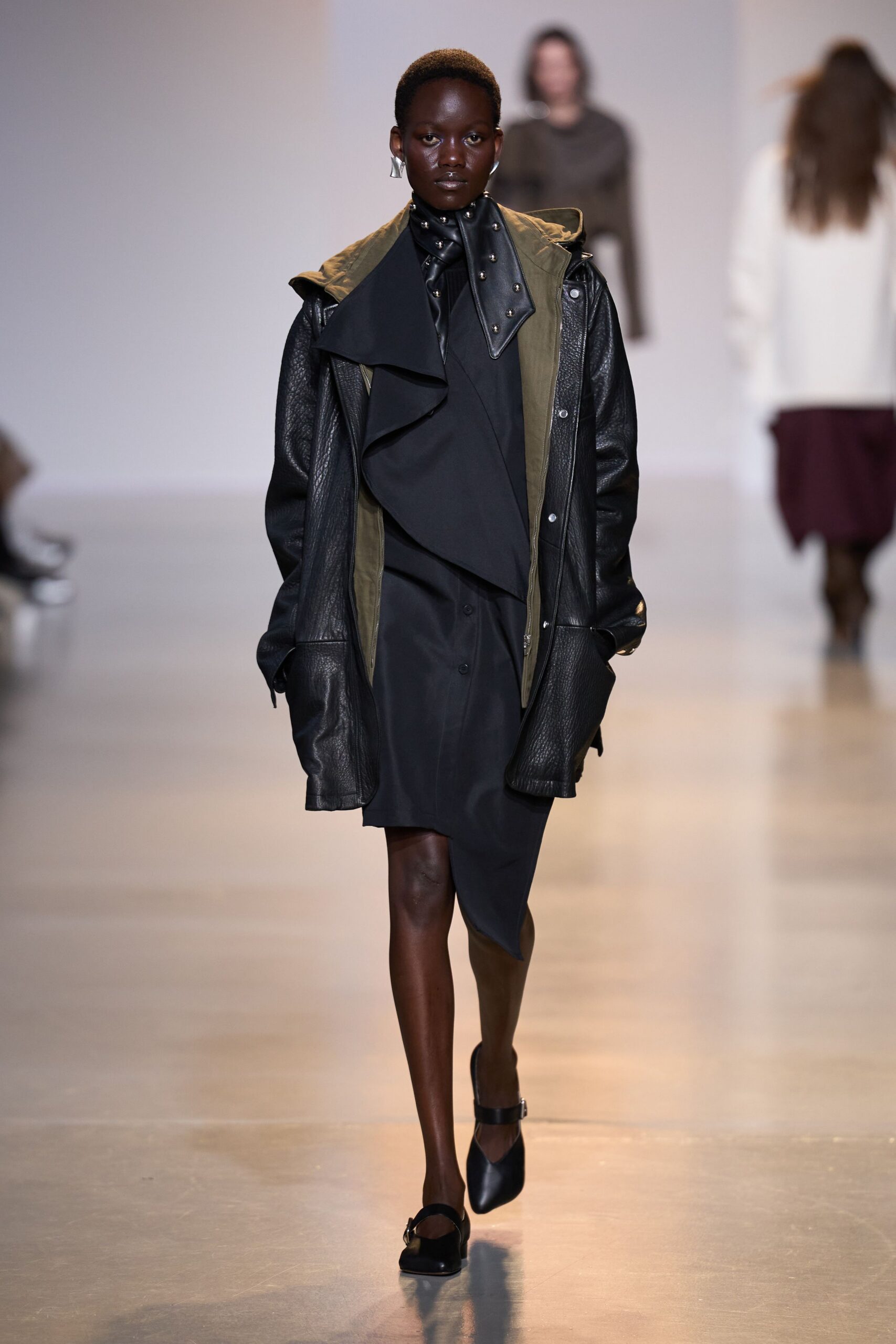 black leather long-sleeve oversized layered coat