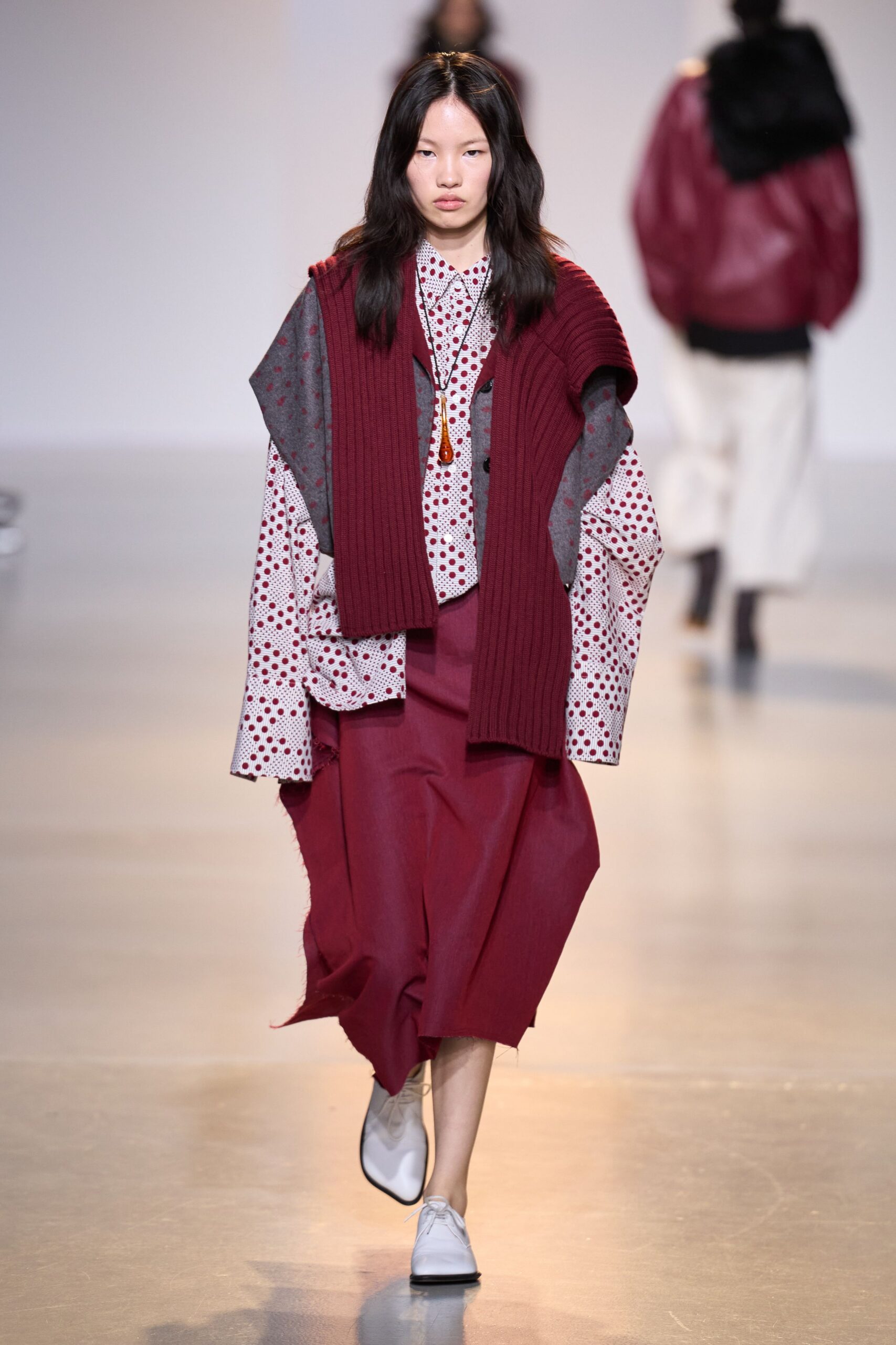 red wool sleeveless oversized sweater