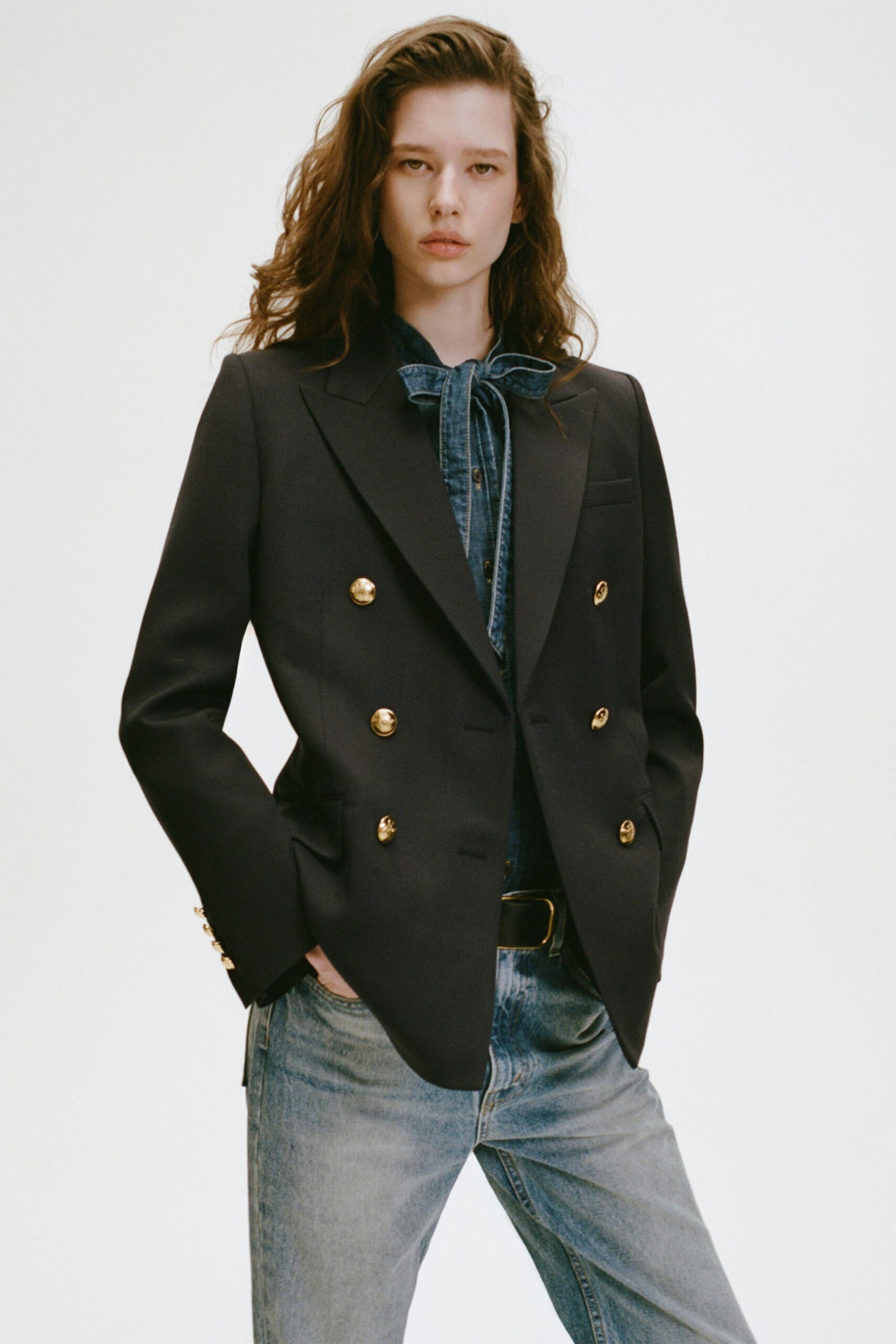 black tailored blazer with denim shirt