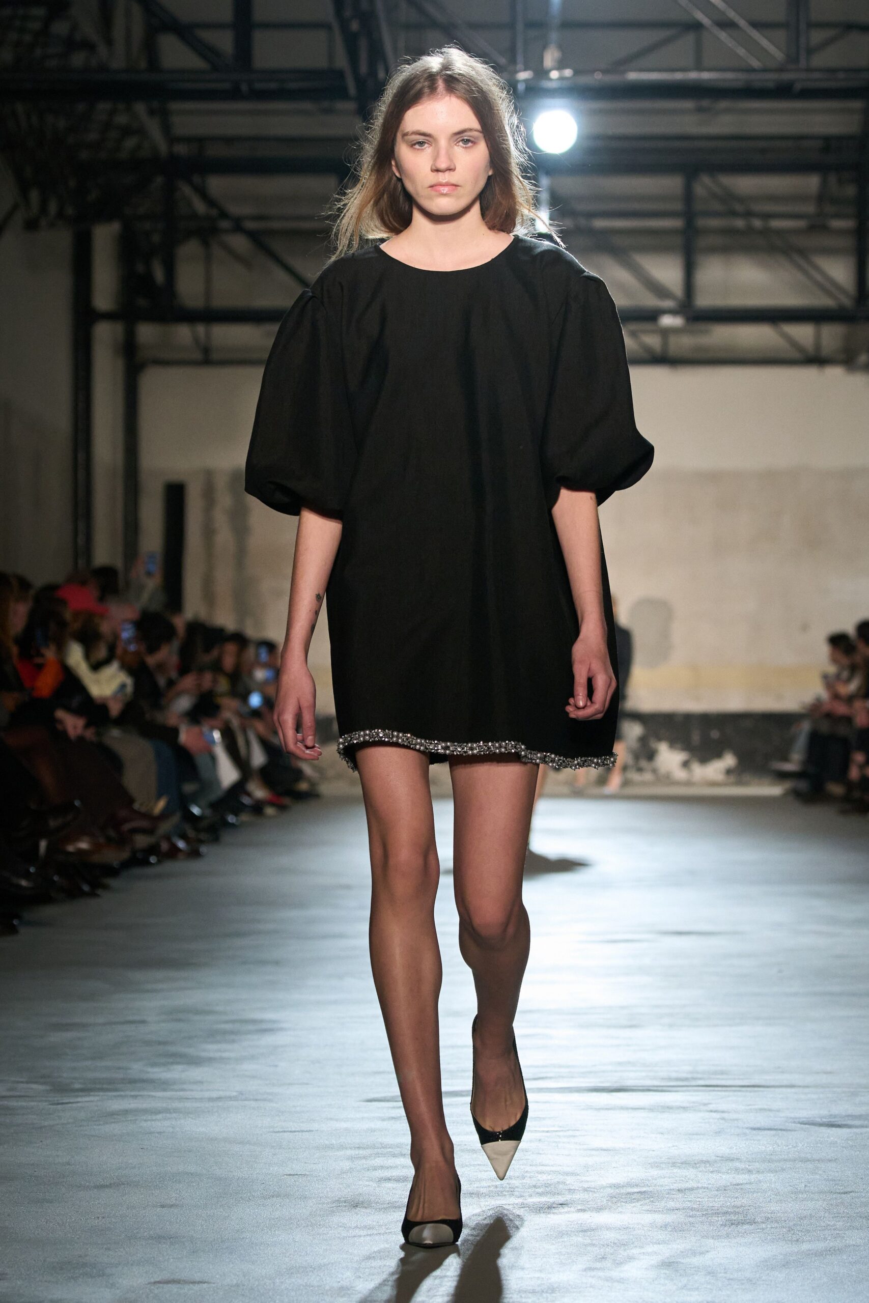 black relaxed mini dress with pointed shoes
