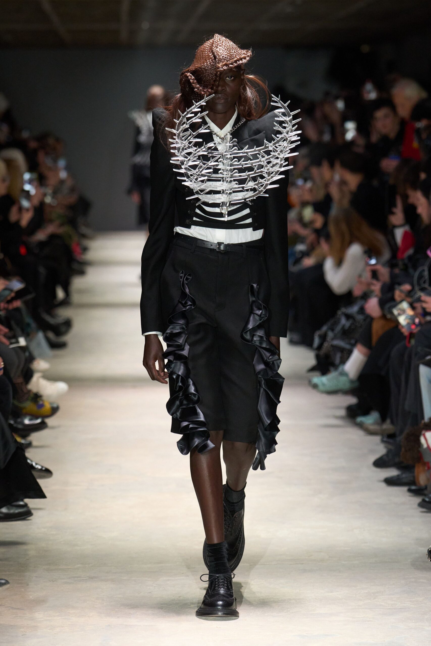black blazer white shirt ruffled skirt