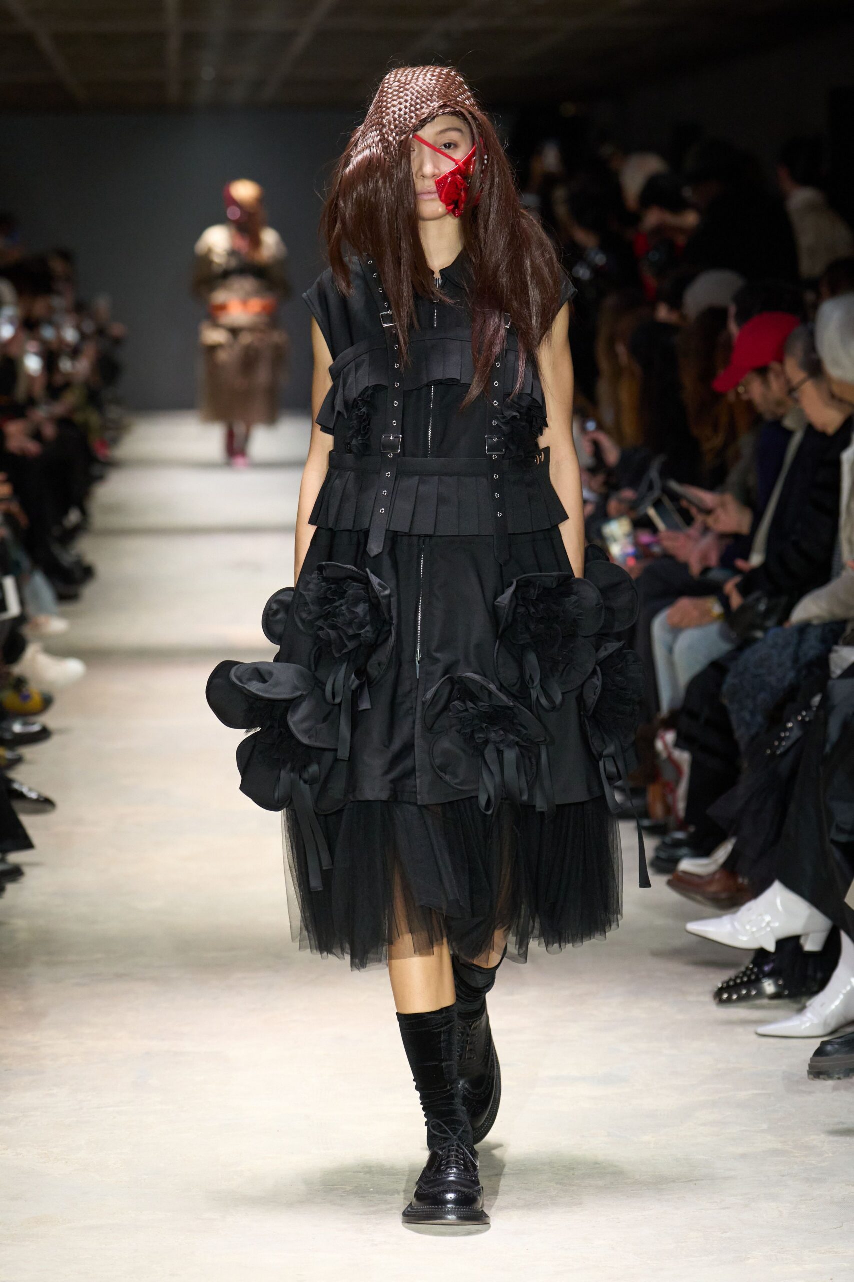 black layered ruffled midi dress with boots