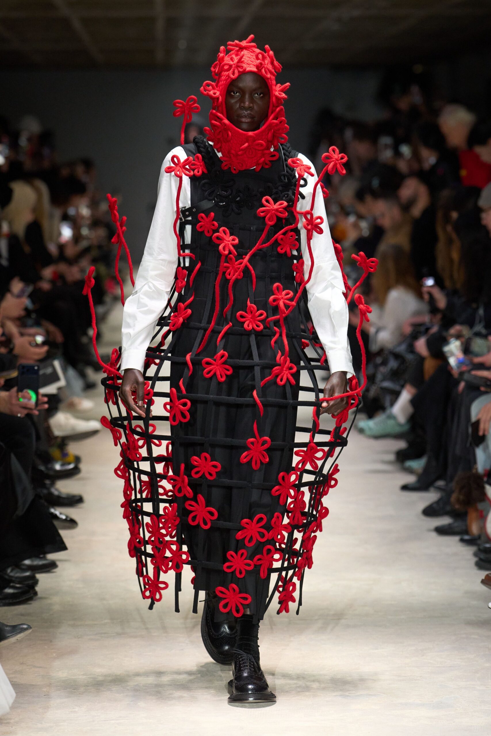black and white layered dress with red embellishments