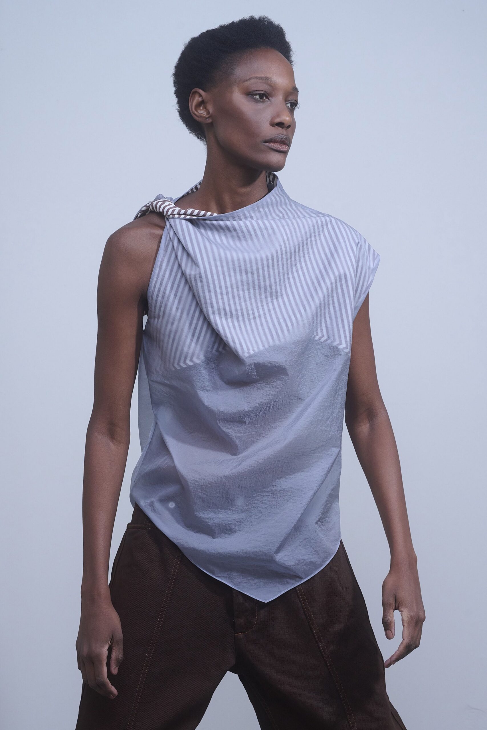 gray striped sleeveless top with brown wide-leg pants